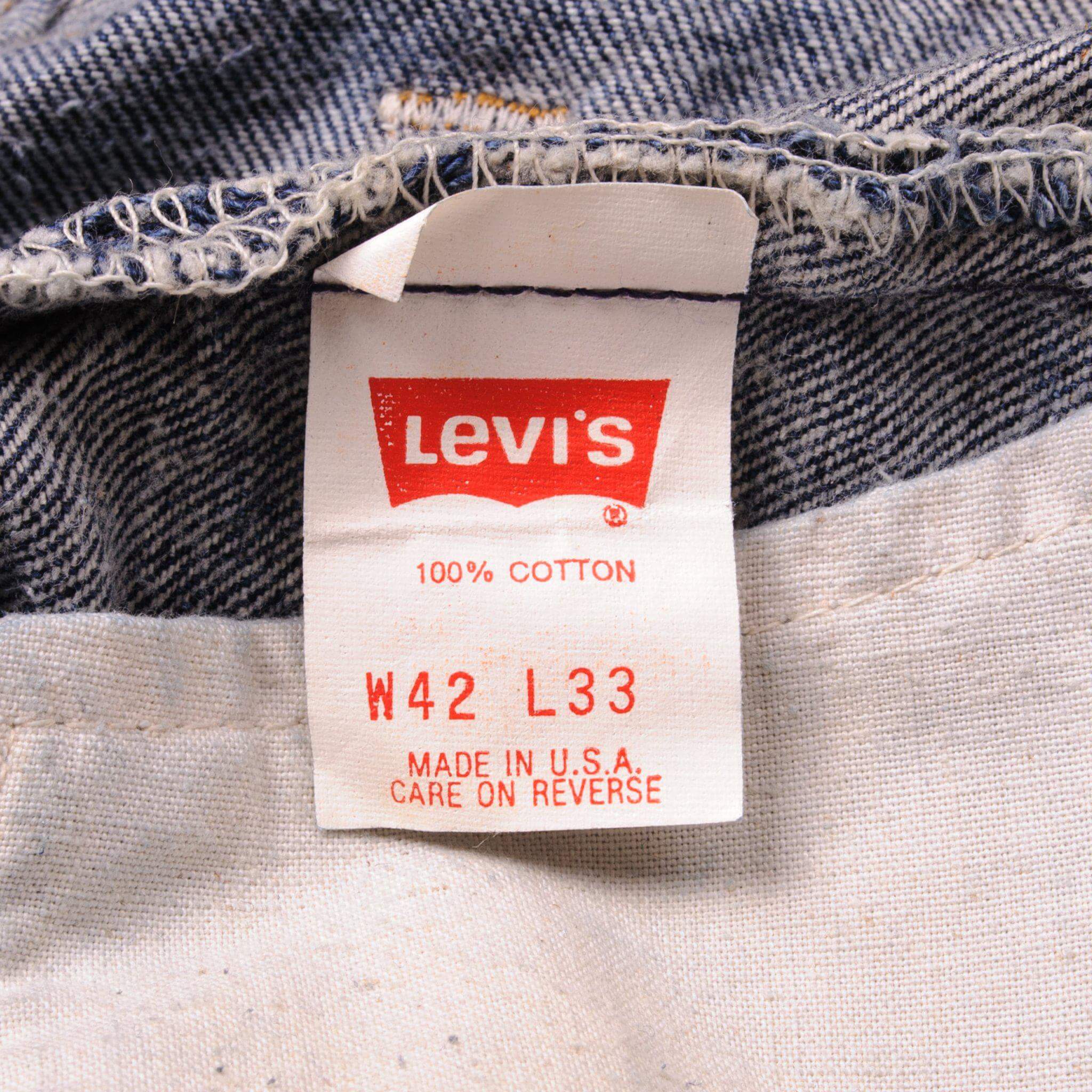 Beautiful Indigo Levis 501 Jeans 1988-1993 Made in USA with a very dark wash. Size on Tag 42X33 ACTUAL SIZE 40X30 Back Button #532