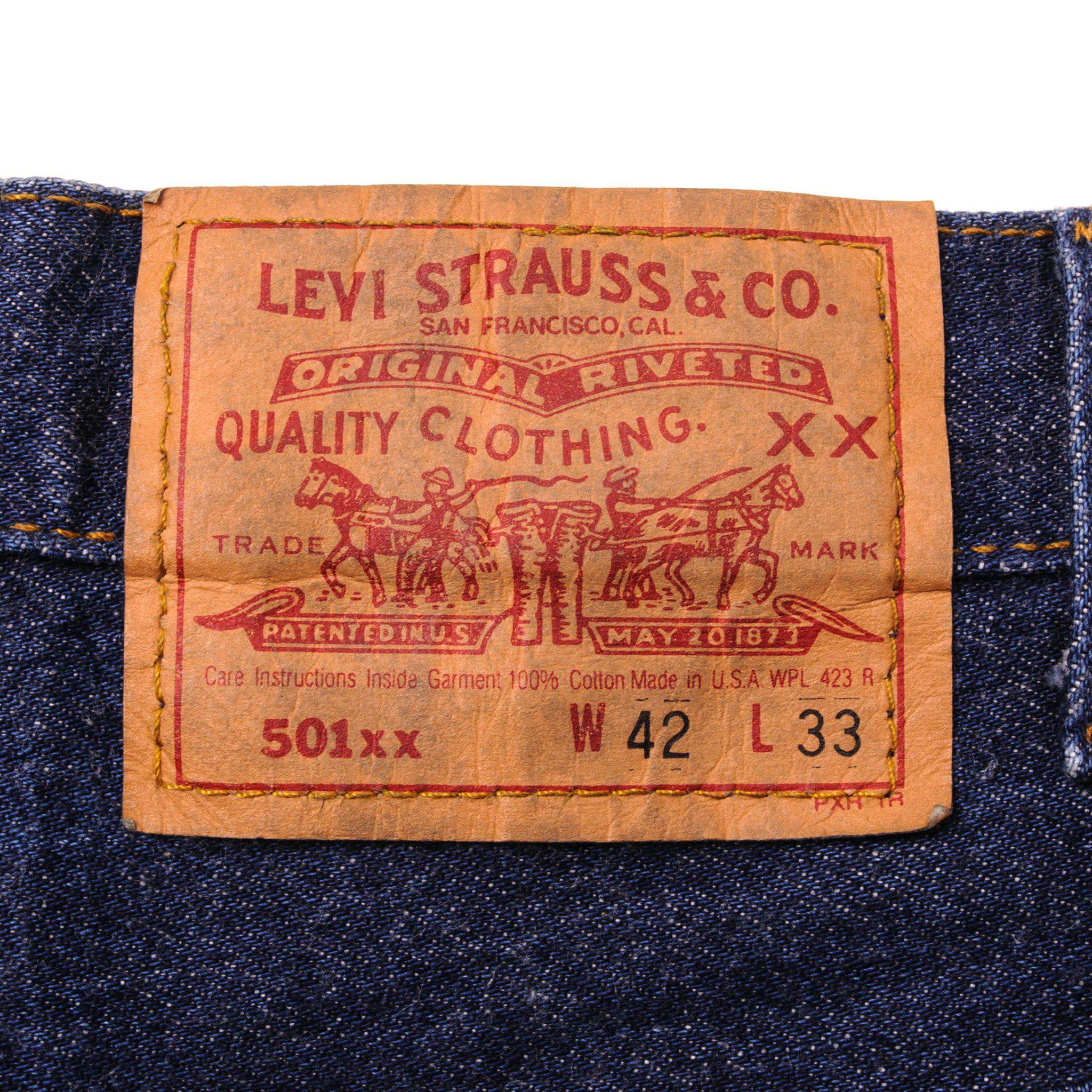 Beautiful Indigo Levis 501 Jeans 1988-1993 Made in USA with a very dark wash. Size on Tag 42X33 ACTUAL SIZE 40X30 Back Button #532