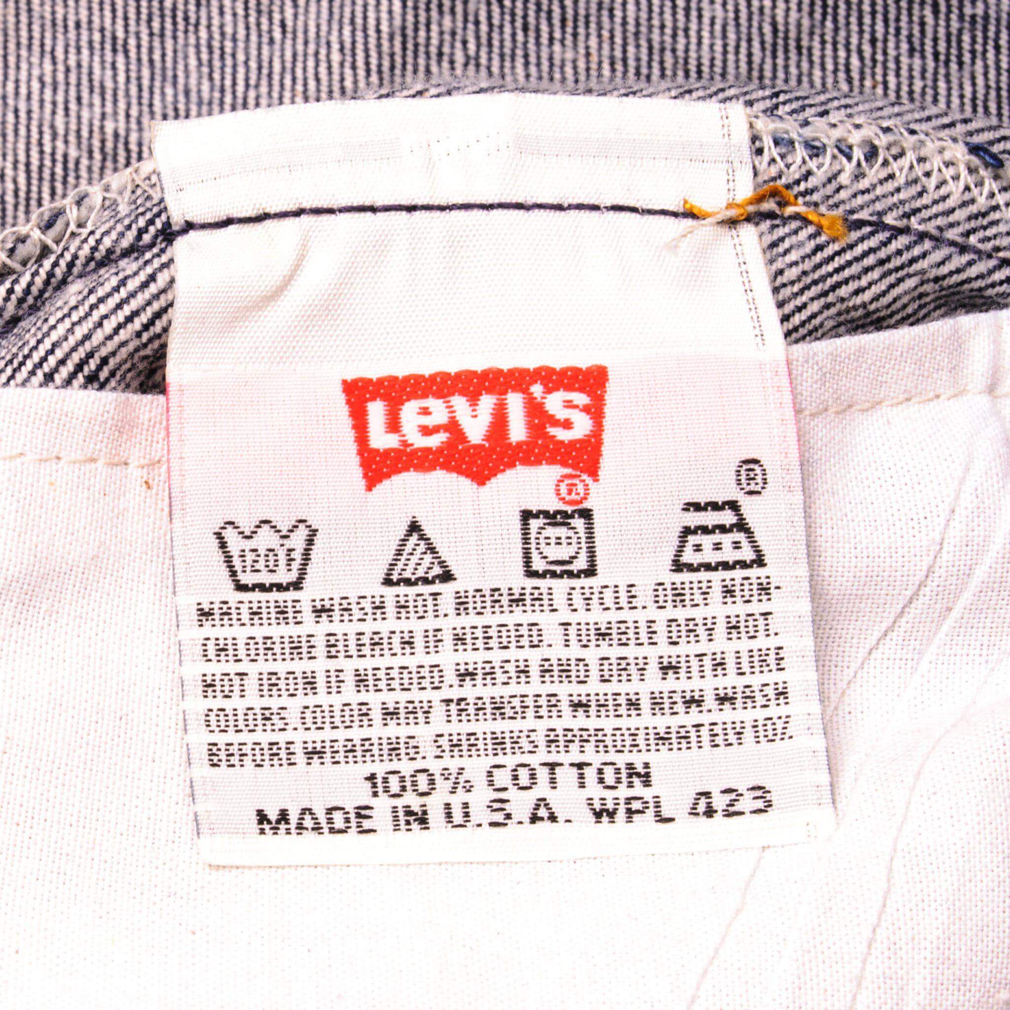 Beautiful Indigo Levis 501 Jeans 1990s Made in USA with a very dark wash. Size on Tag 40X34 ACTUAL SIZE 38X33 Back Button #552