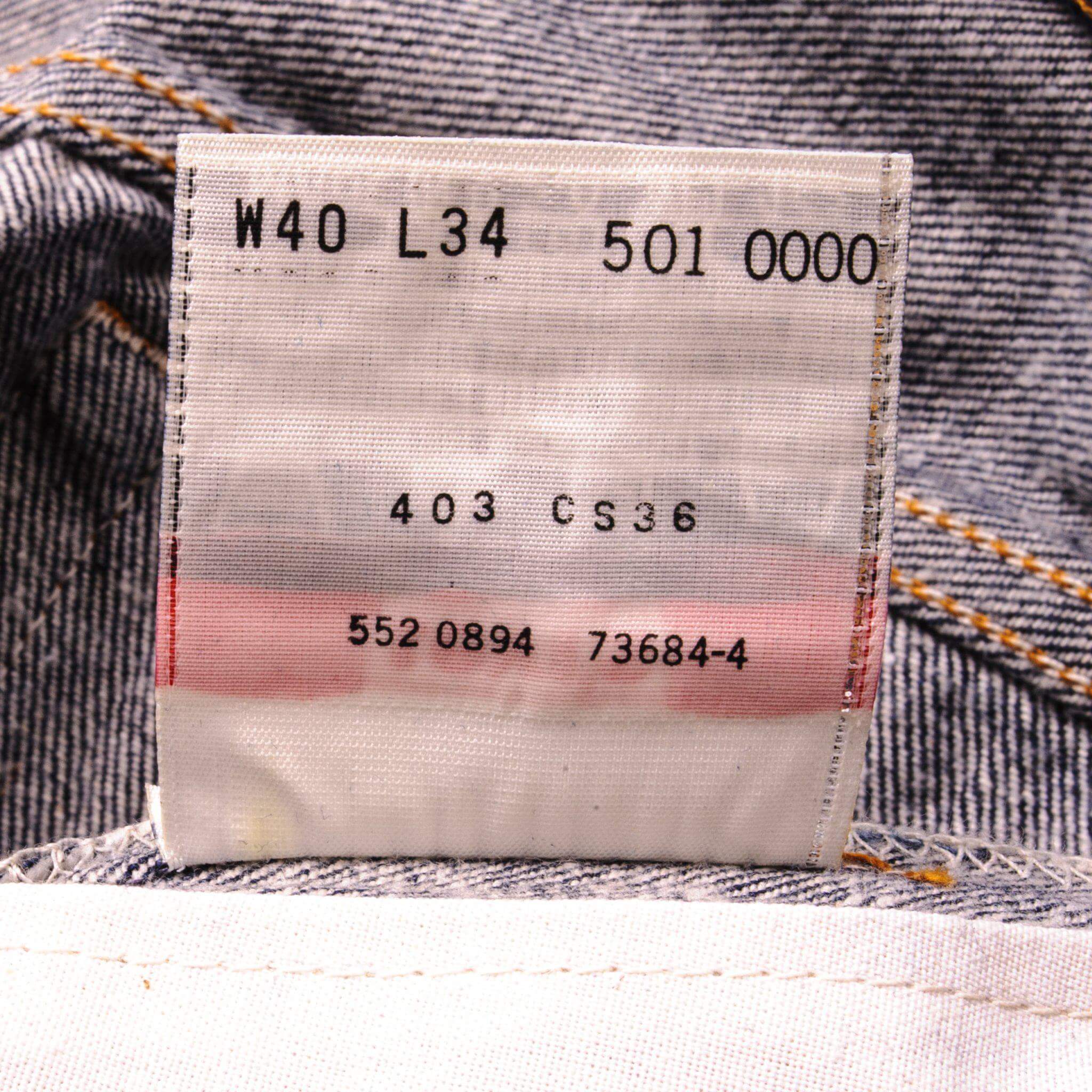 Beautiful Indigo Levis 501 Jeans 1990s Made in USA with a very dark wash. Size on Tag 40X34 ACTUAL SIZE 38X33 Back Button #552