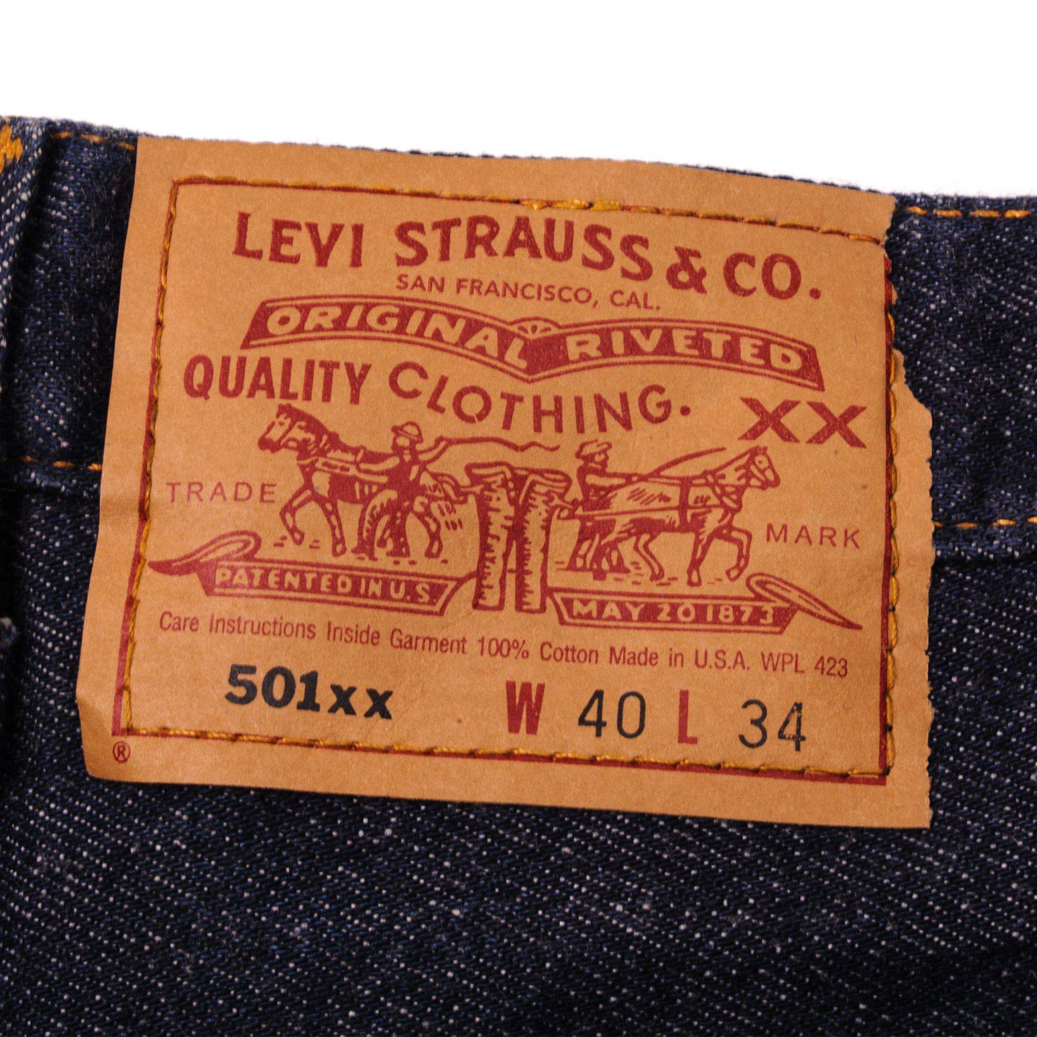 Beautiful Indigo Levis 501 Jeans 1990s Made in USA with a very dark wash. Size on Tag 40X34 ACTUAL SIZE 38X33 Back Button #552