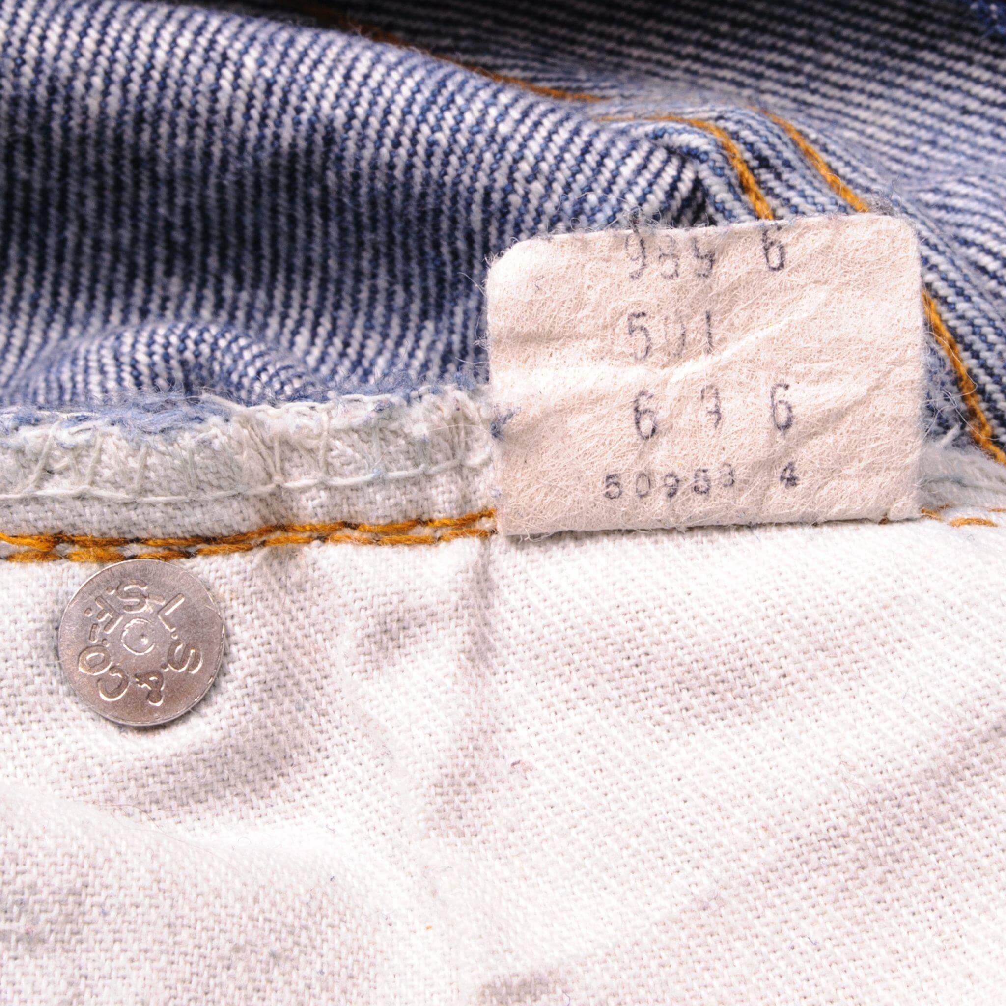 Beautiful Indigo Levis 501 Jeans with selvedge 1980s Made in USA with a medium blue wash and a nice contrast of light and medium blue. Size on Tag 34X34 ACTUAL SIZE 32X30 Back Button #6