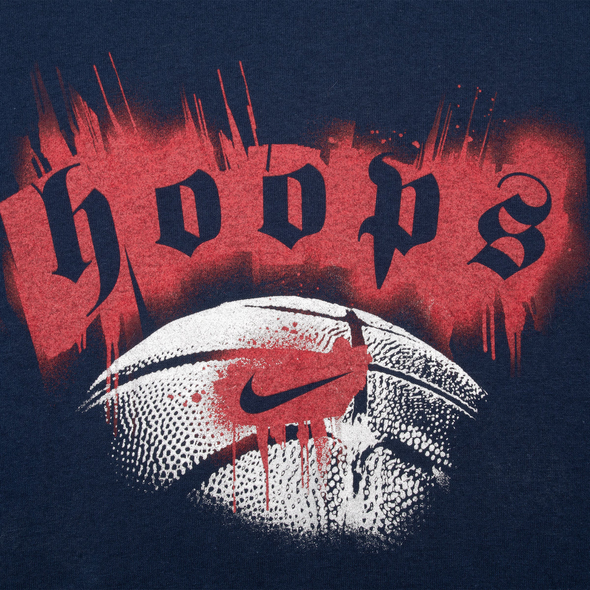 Close-up of red Hoops lettering and white basketball graphic with Nike Swoosh
