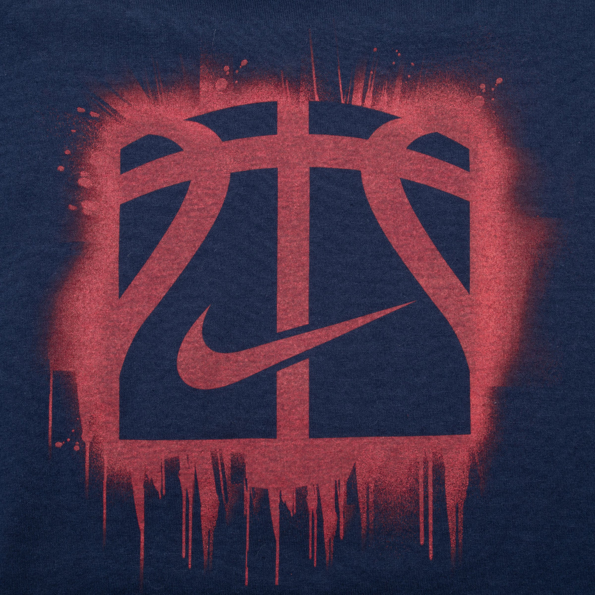 Close-up of red basketball outline and Nike Swoosh back graphic
