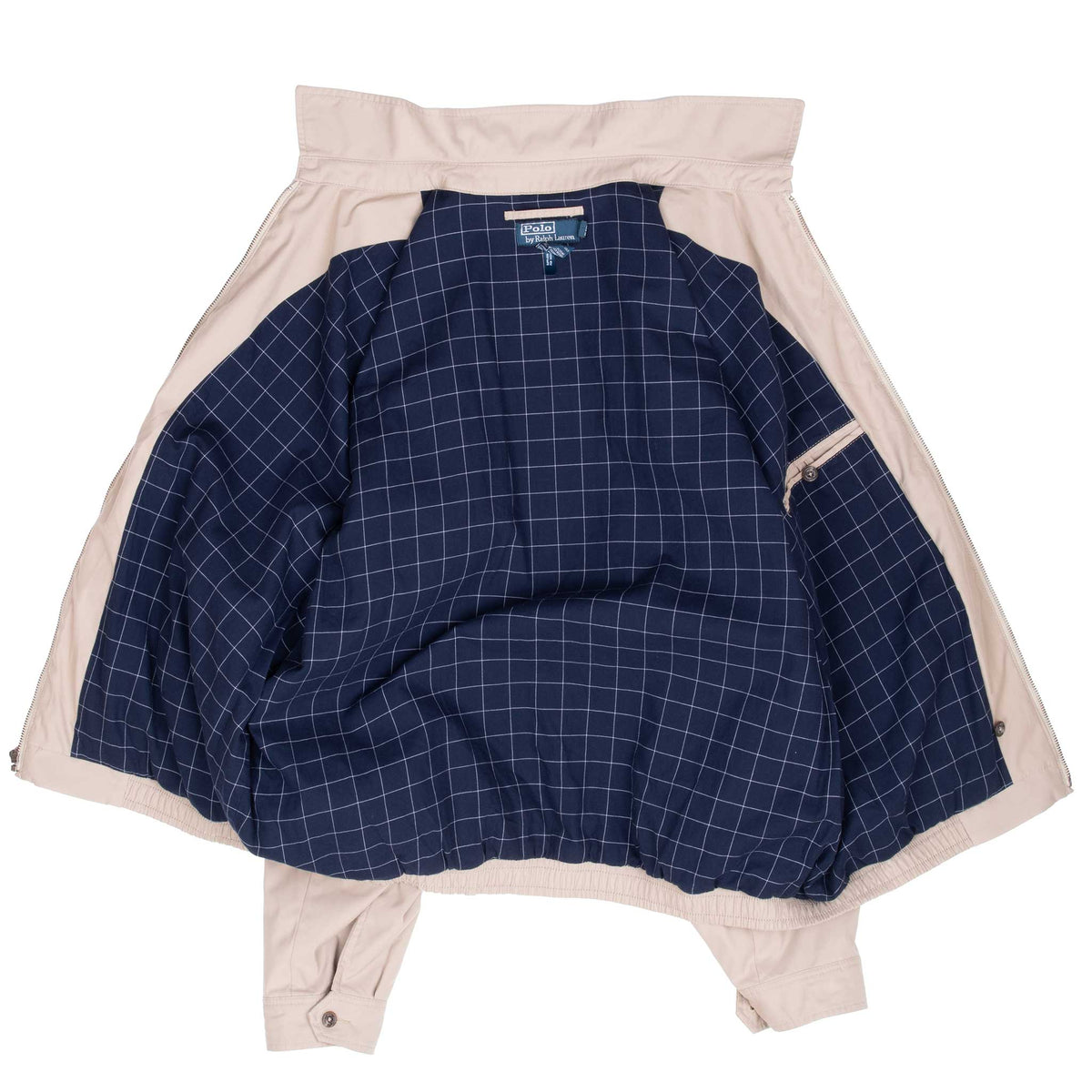 Open Polo Ralph Lauren jacket showing navy windowpane-check lining and inner pocket
