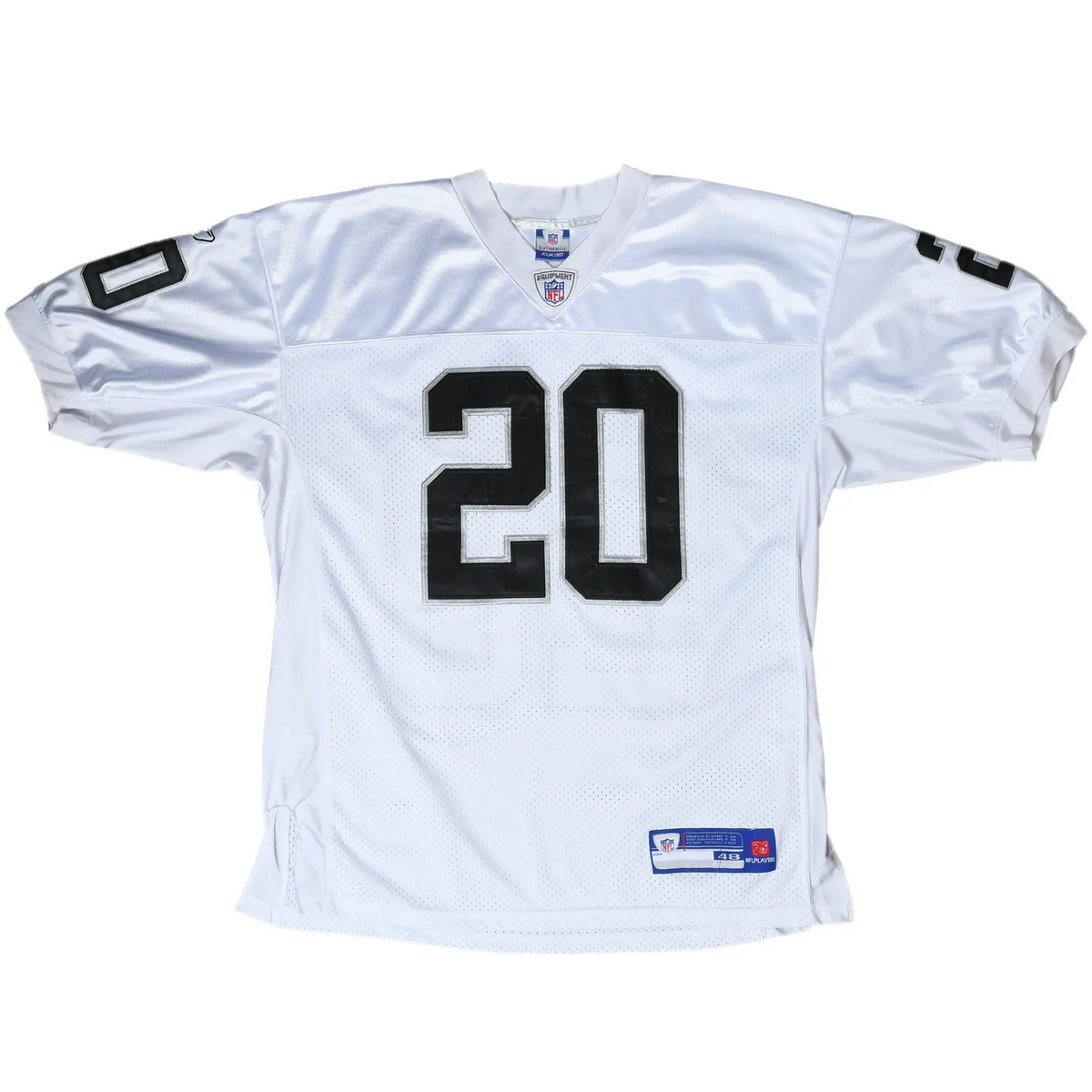 Front of white Reebok Oakland Raiders jersey with black number 20 and short sleeves