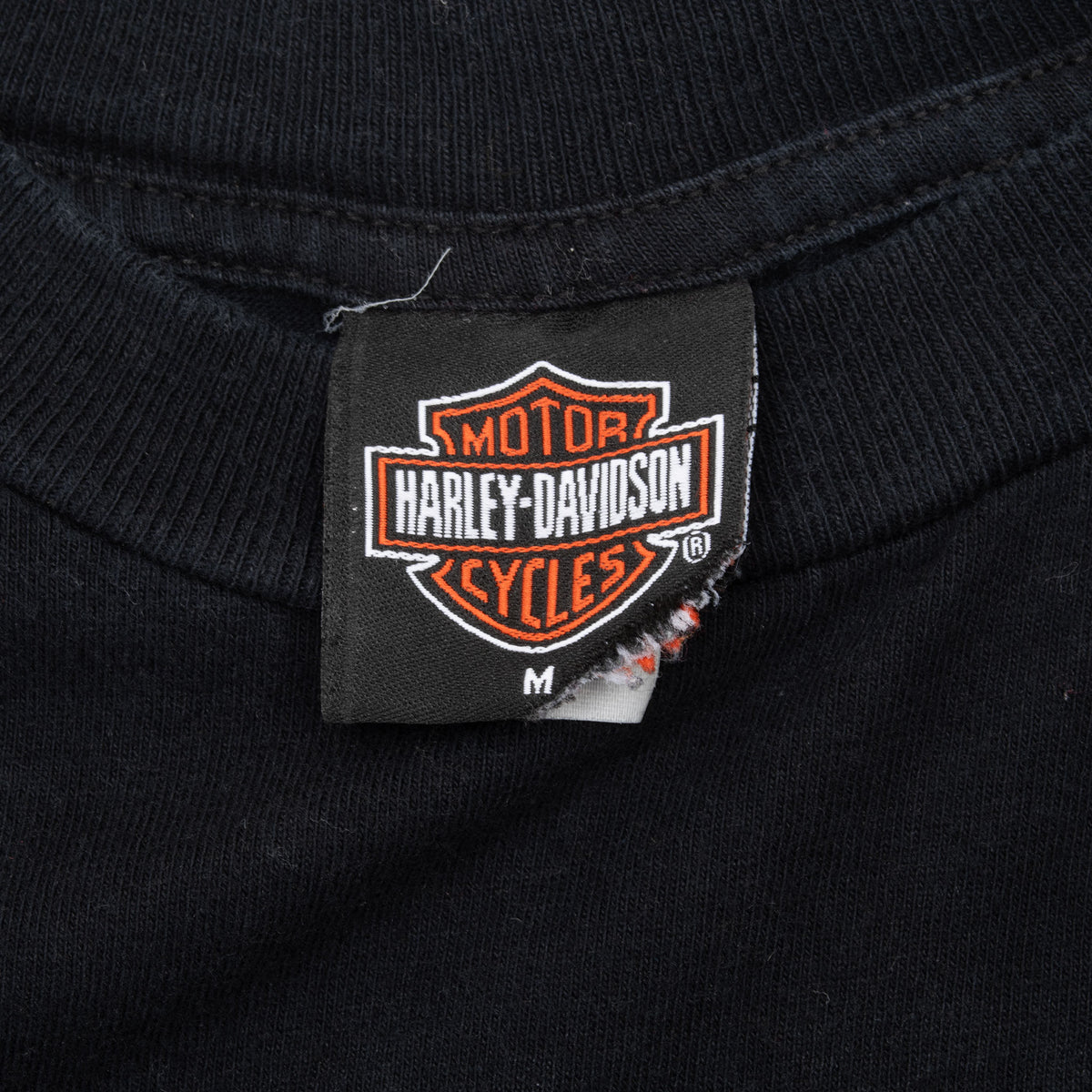 Harley-Davidson Motor Cycles neck tag marked size M on black T-shirt