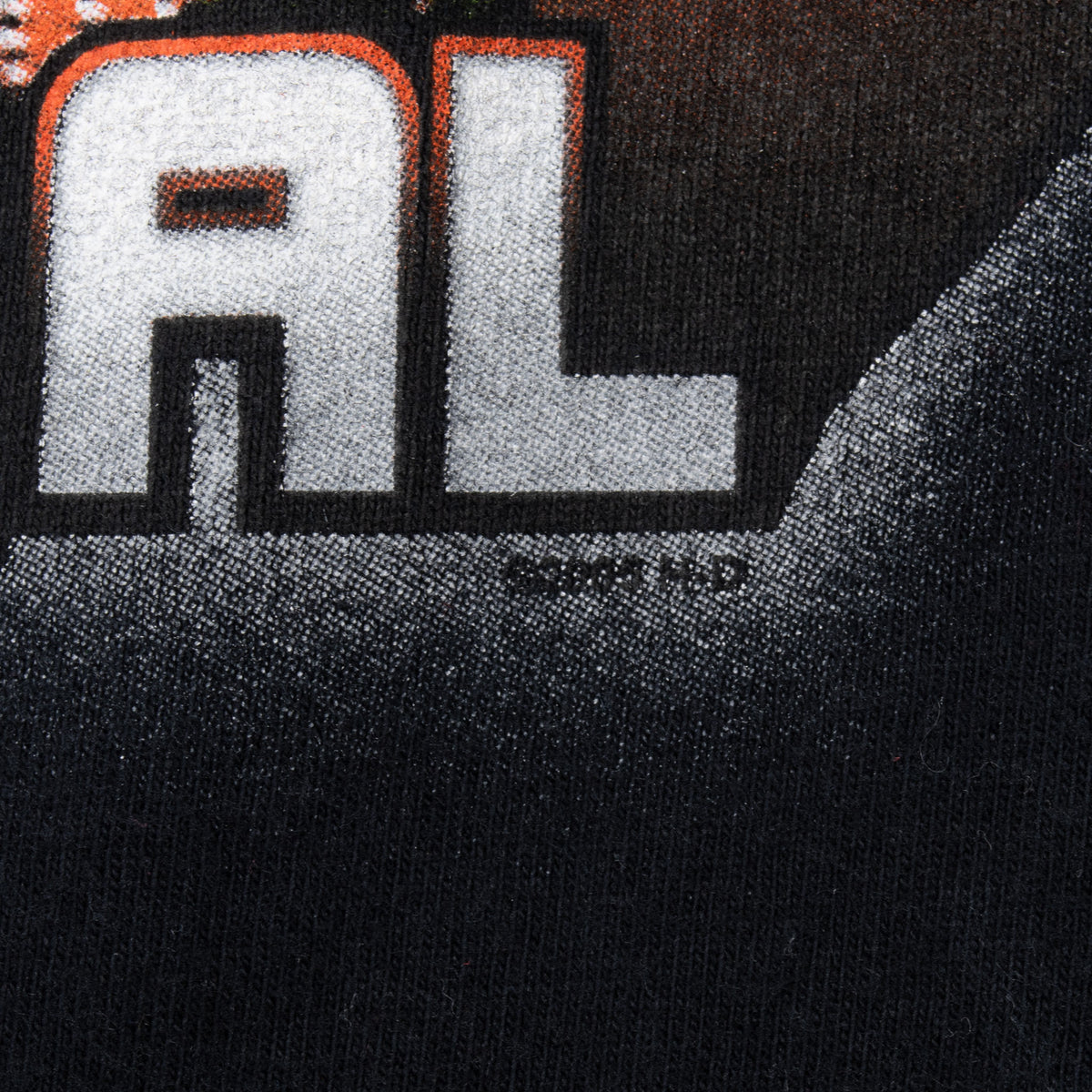Close-up of Birmingham, AL graphic lettering printed on black fabric