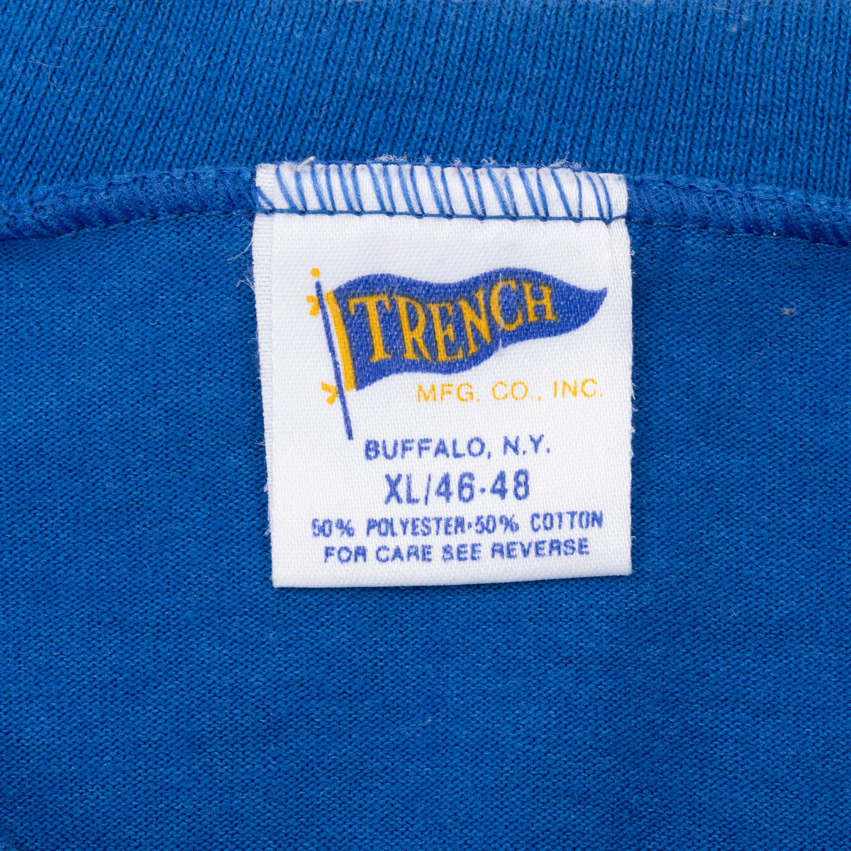 Trench Mfg. Co. XL 46-48 neck tag on blue Seattle Seahawks tee
