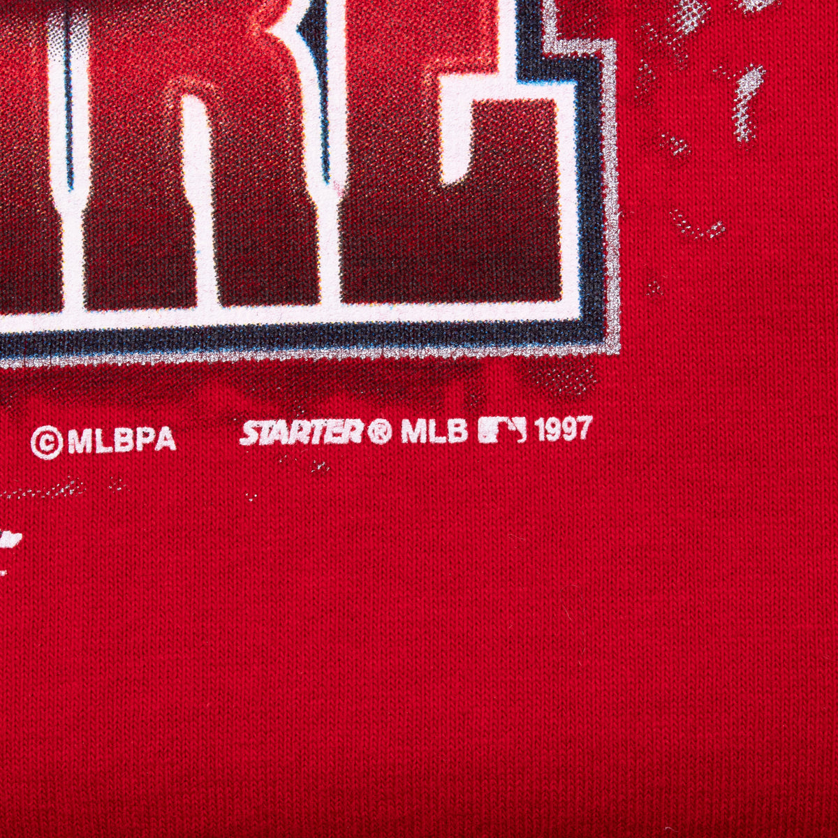 Close-up of MLBPA, Starter, MLB and 1997 copyright print