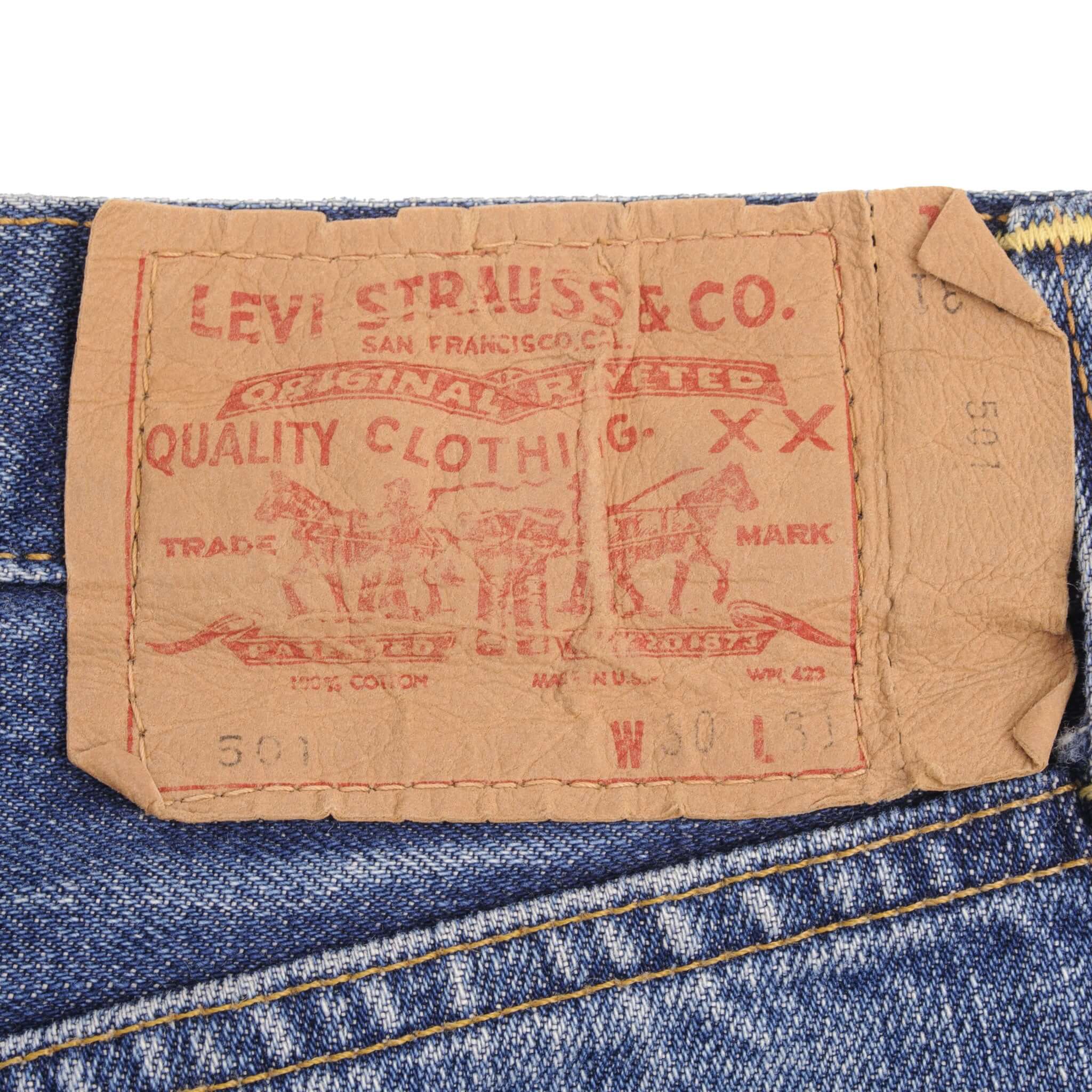 Beautiful Indigo Levis 501 Jeans with Redline and Big E 1970S Made in USA. AMAZING WASH with a medium blue wash, a nice contrast of light and medium blue with light whiskers. SIZE ON TAG 30X31 ACTUAL Size 29x28 Back Button #6
