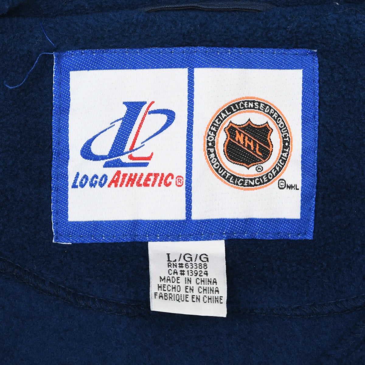 Logo Athletic and NHL licensed product labels inside St. Louis Blues fleece jacket