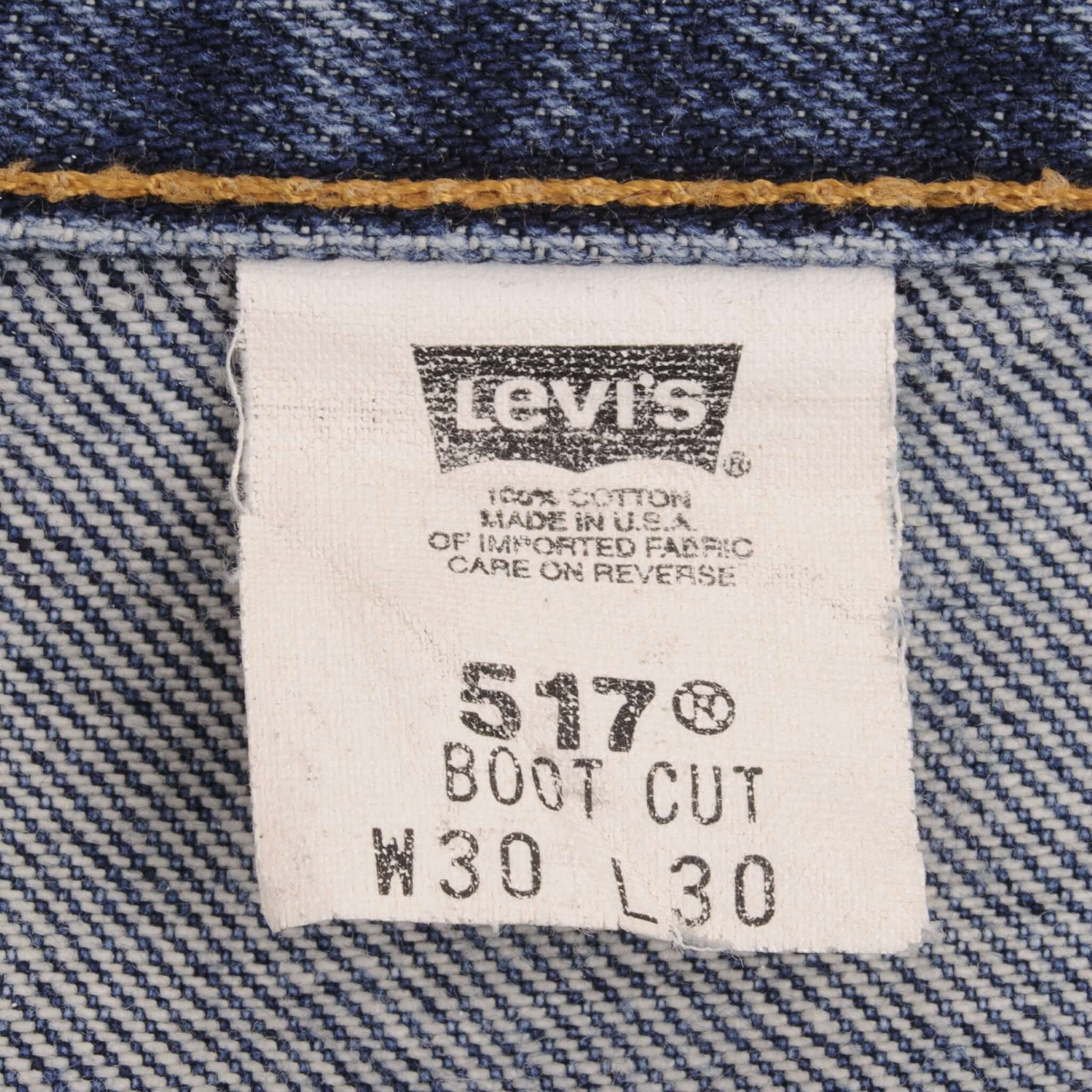 Beautiful Indigo Levis 517 Jeans 1990s Made in USA with Medium Dark Blue Wash With Beautiful Whiskers. Size on tag 30X30 Back Button #554