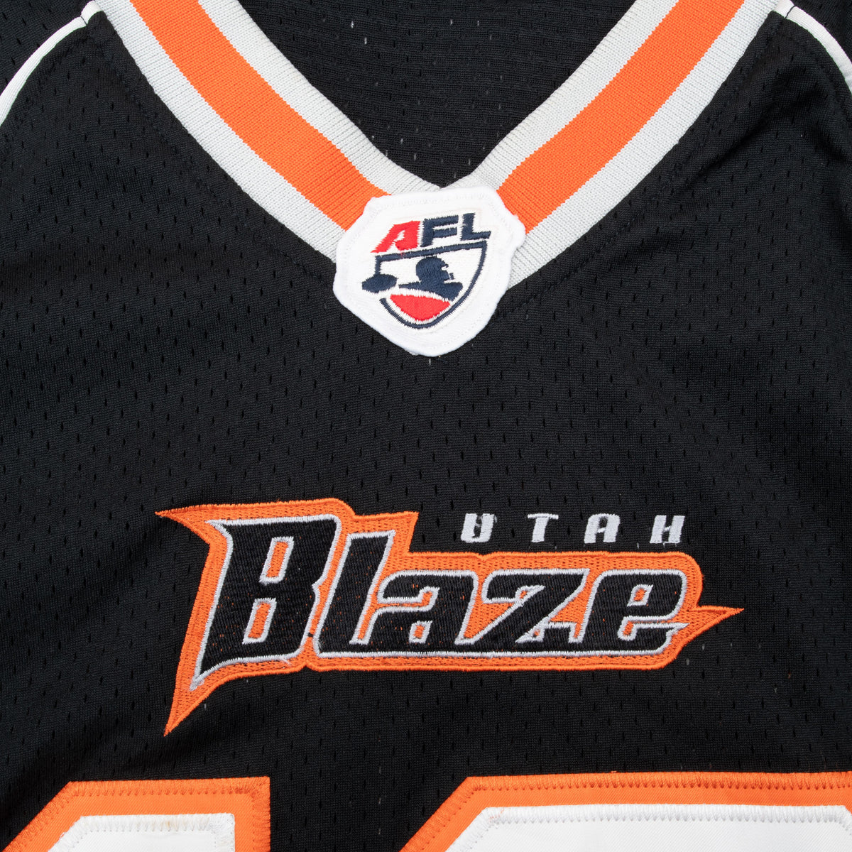 Utah Blaze embroidered chest logo and AFL shield at the V-neck
