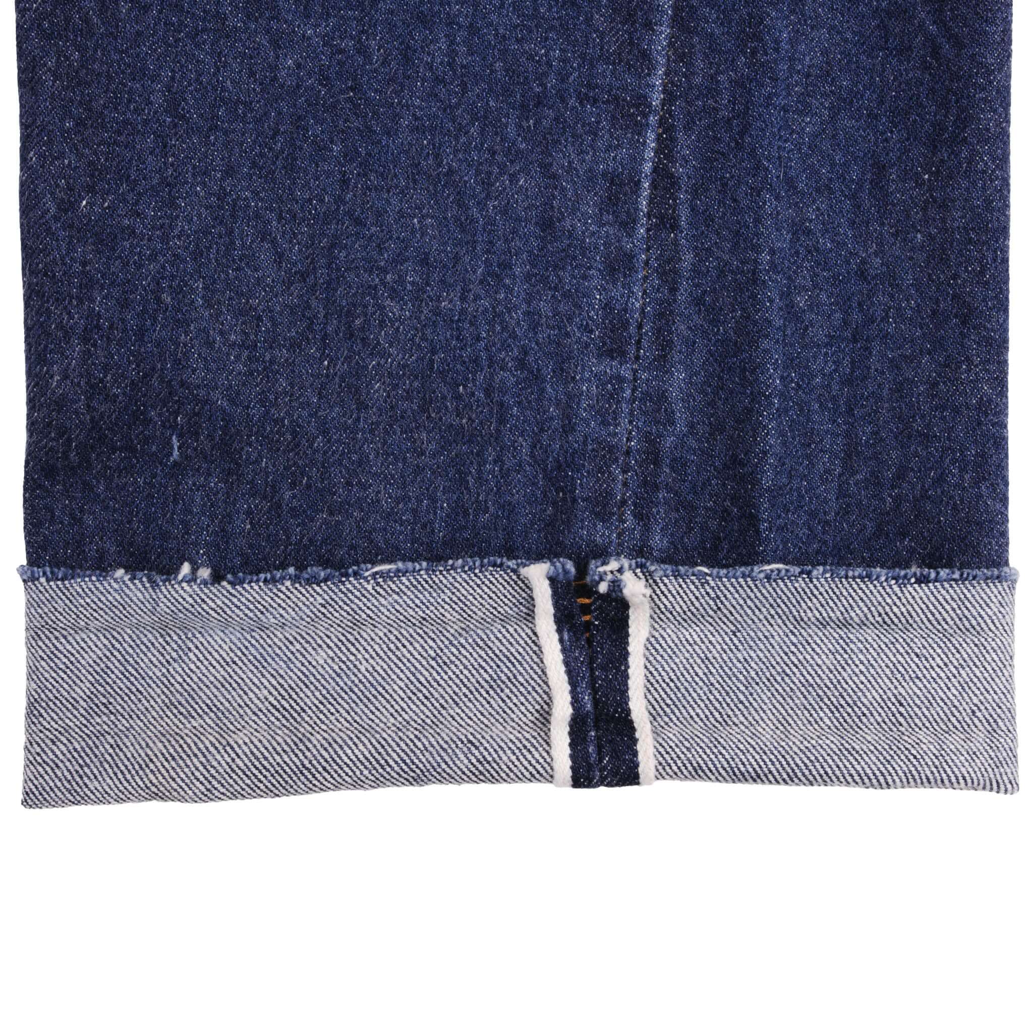 Beautiful Indigo Levis 501 Jeans with Selvedge Redline 1970S Made in USA. Amazing Wash with a dark blue wash. Size On Tag 29X28 Back Button #653