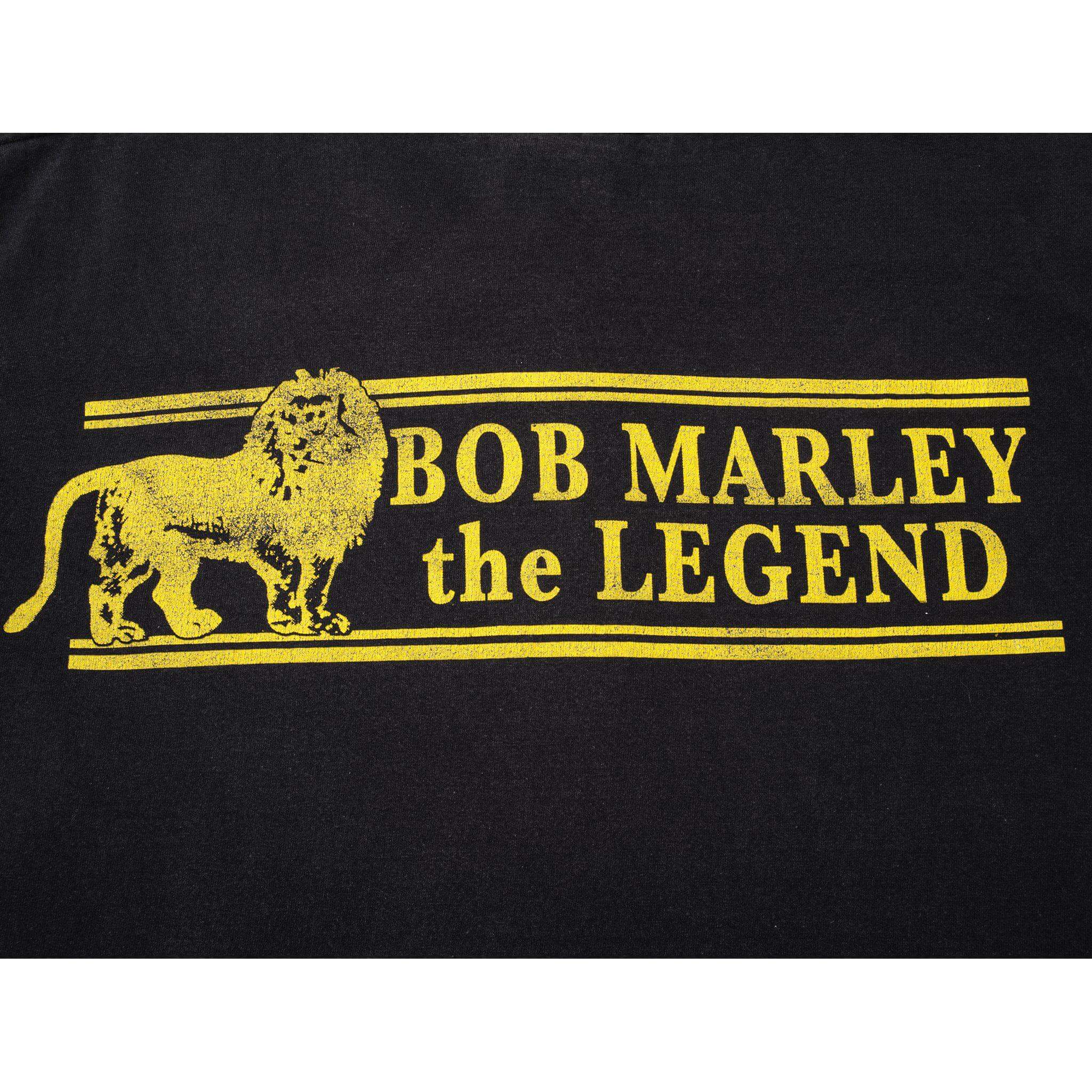 Yellow lion and Bob Marley the Legend back print on black fabric