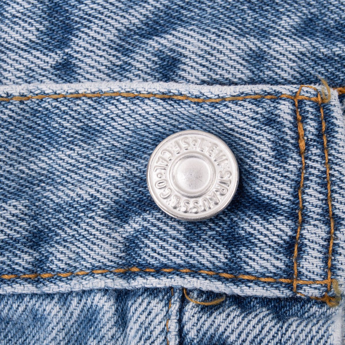 Levi Strauss & Co. engraved waistband button detail