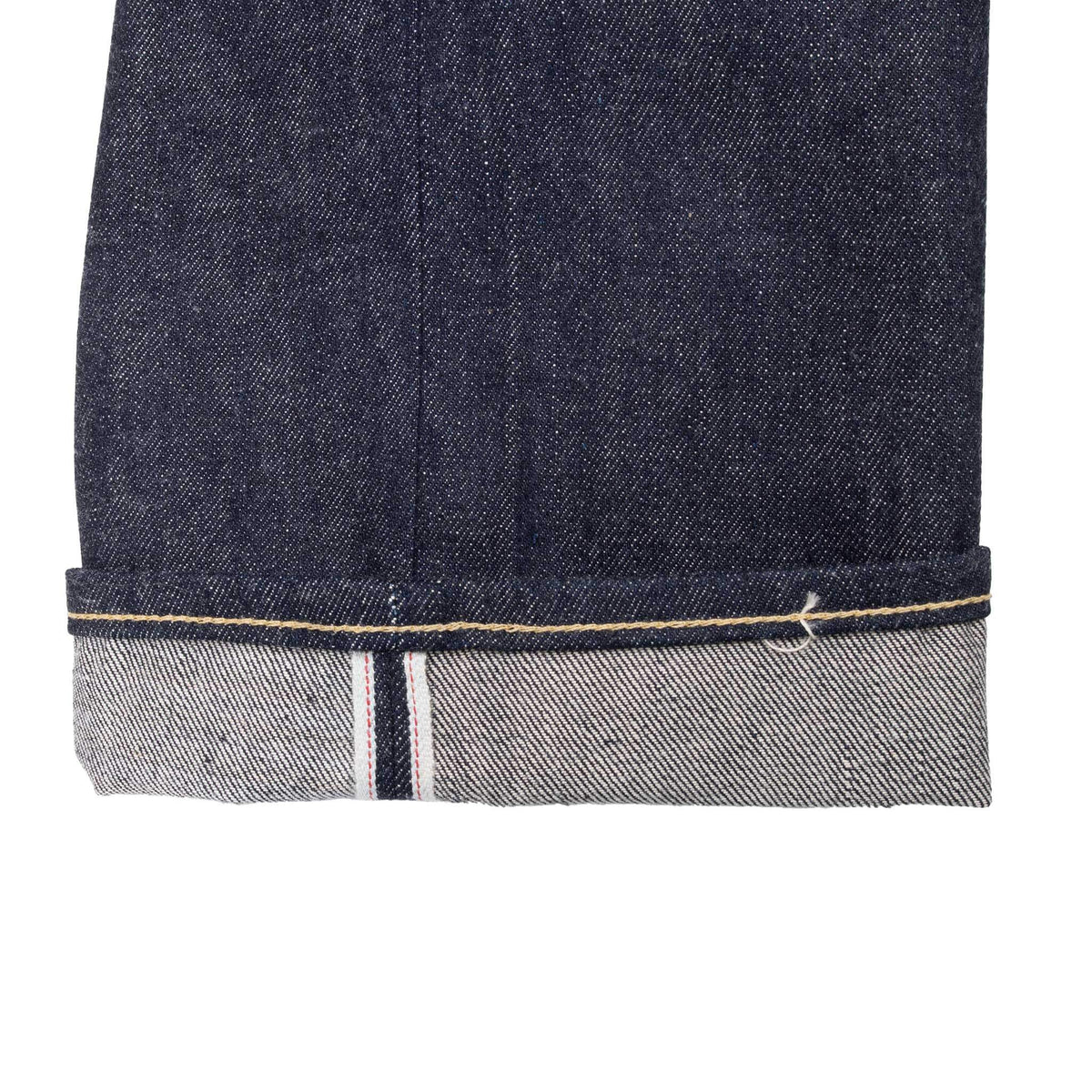 Cuffed jean hem showing red line selvedge detail