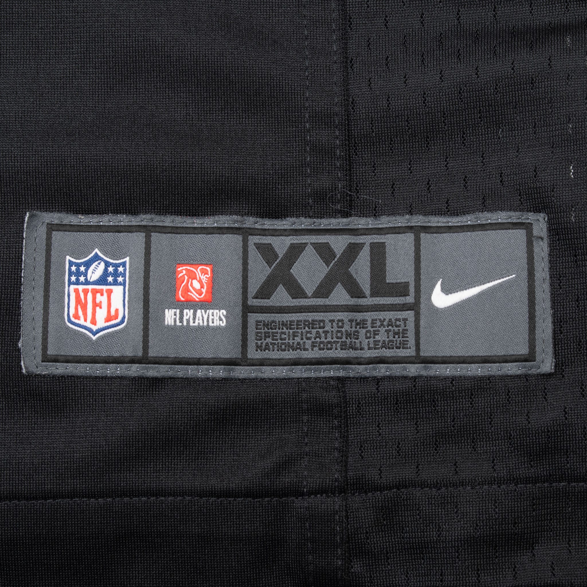 Nike NFL Players XXL jock tag at the lower front hem of the jersey