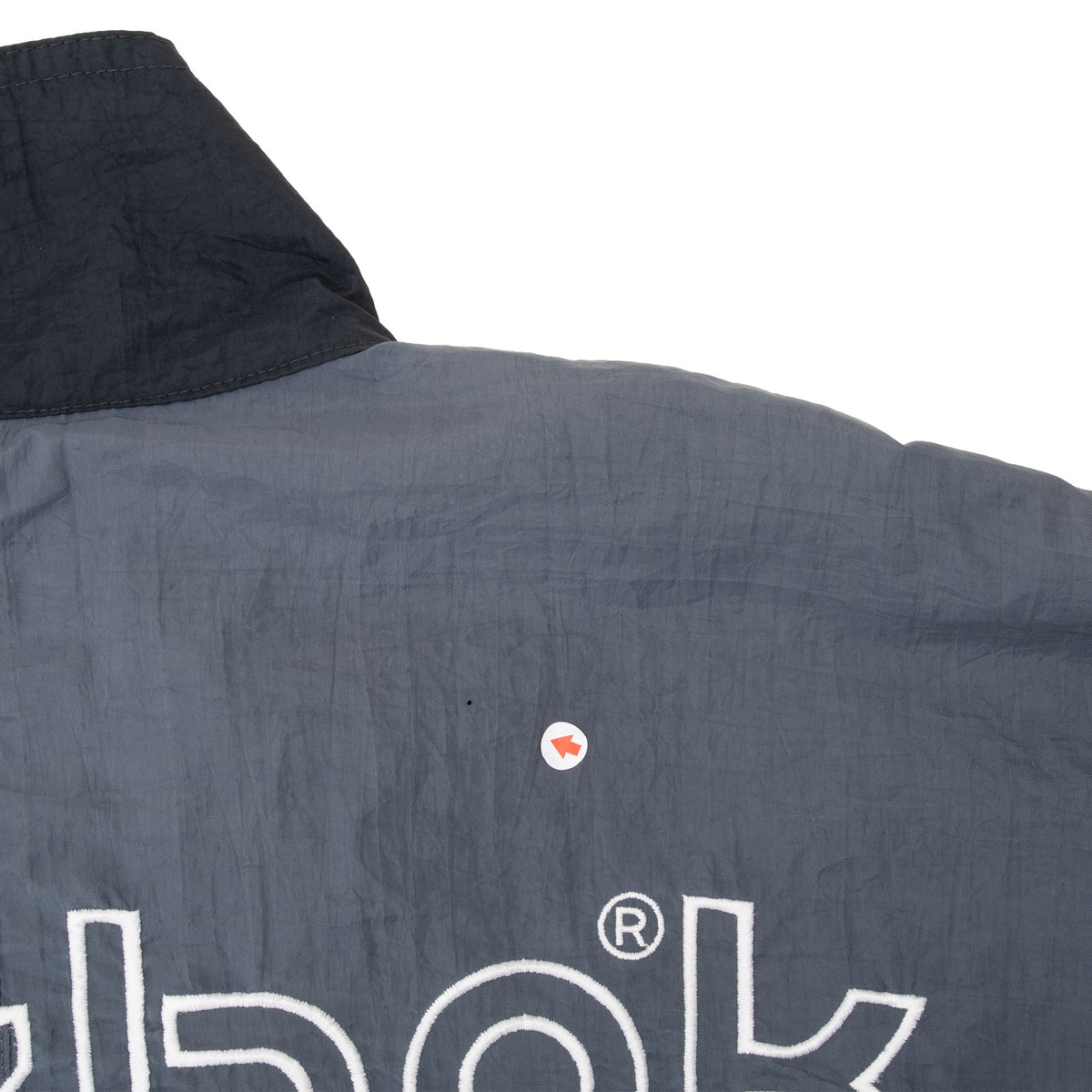 Close-up of small mark on gray upper back near the Reebok graphic