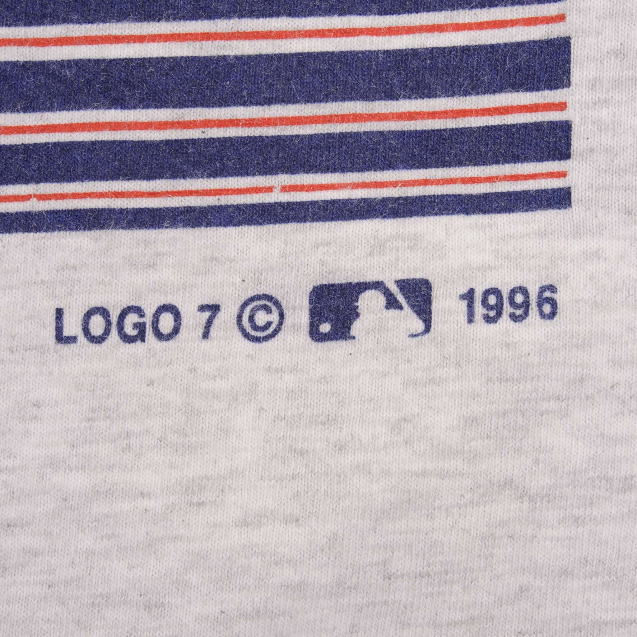 Close-up of Logo 7, MLB logo and 1996 copyright print beneath front graphic