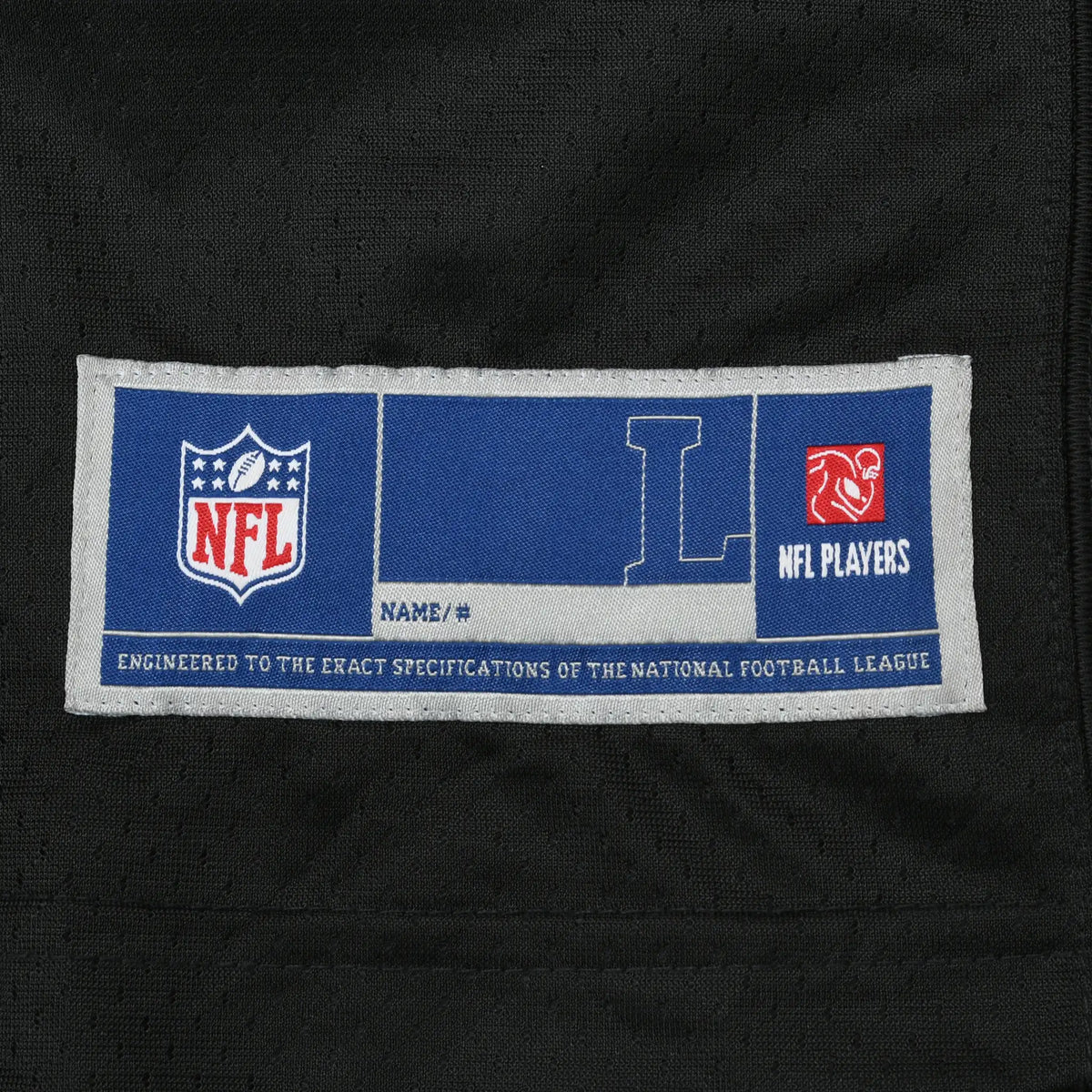 Close-up of NFL size large jock tag on black jersey