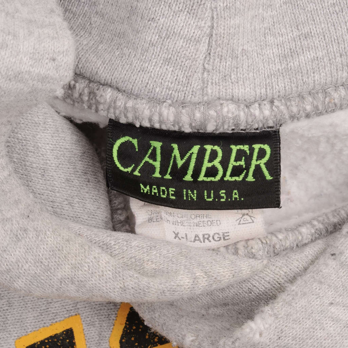 Camber Made in U.S.A. neck label and XL size tag inside gray hoodie