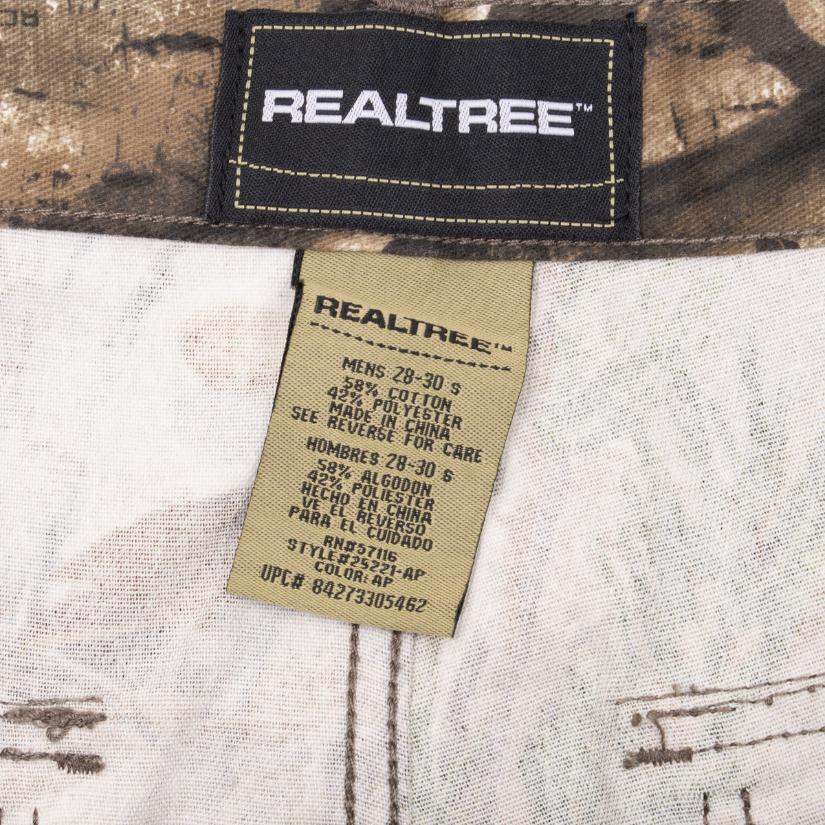 Realtree waistband label and size 30 x 32 care tag inside camouflage cargo pants