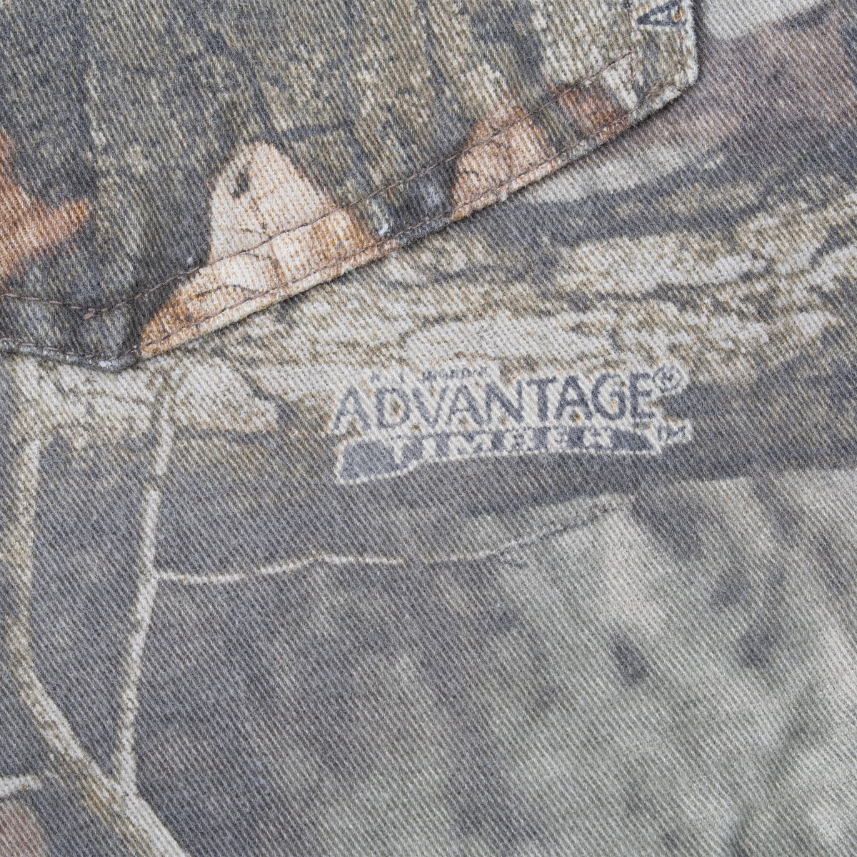 Close-up of Advantage Timber camouflage logo printed on the pants