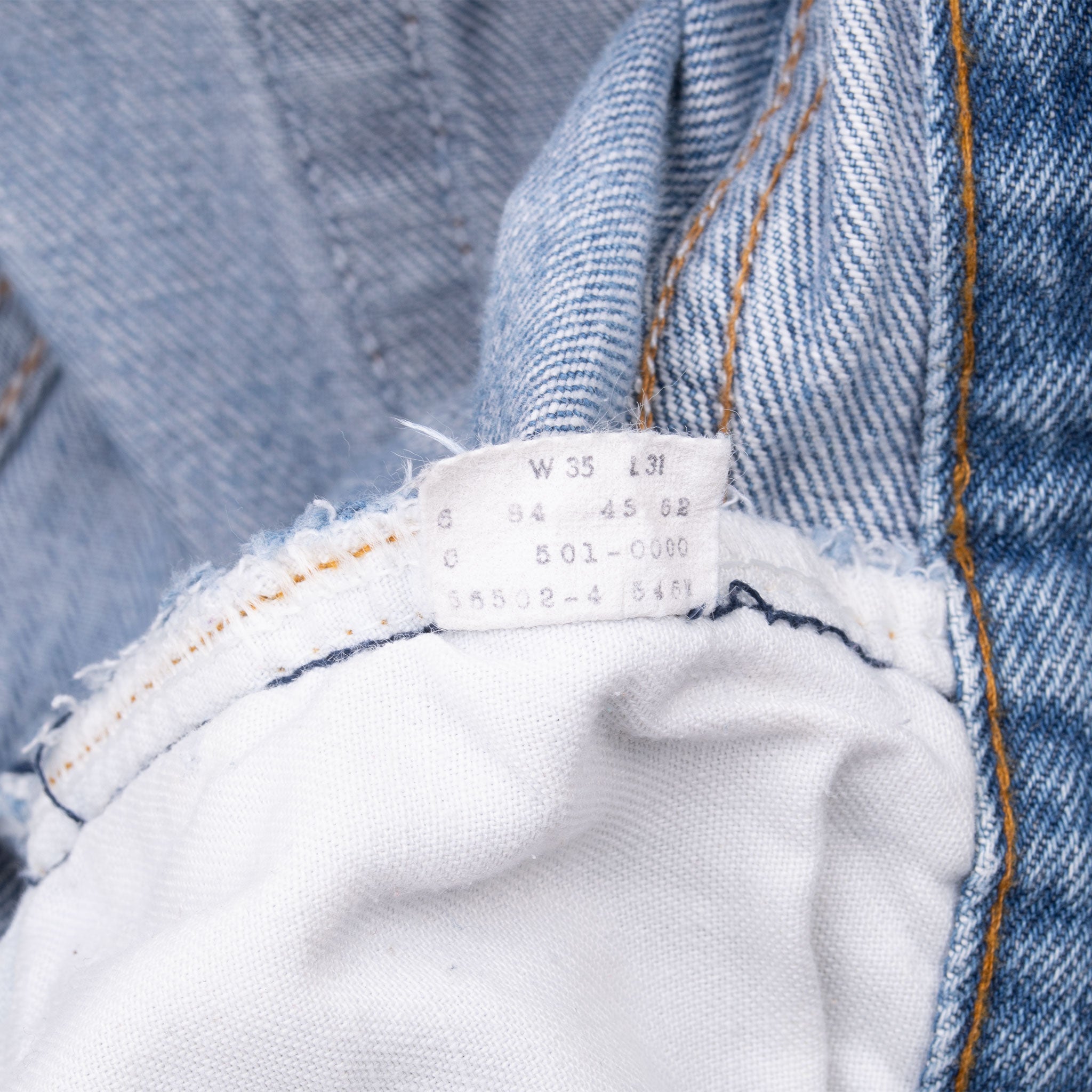 Vintage Levis 501 Indigo Blue Jeans 1980S Size 32X27 Made In Usa With A Medium Light Wash With some light Whiskers
Size on Tag 35X31 Actual Size 32X27