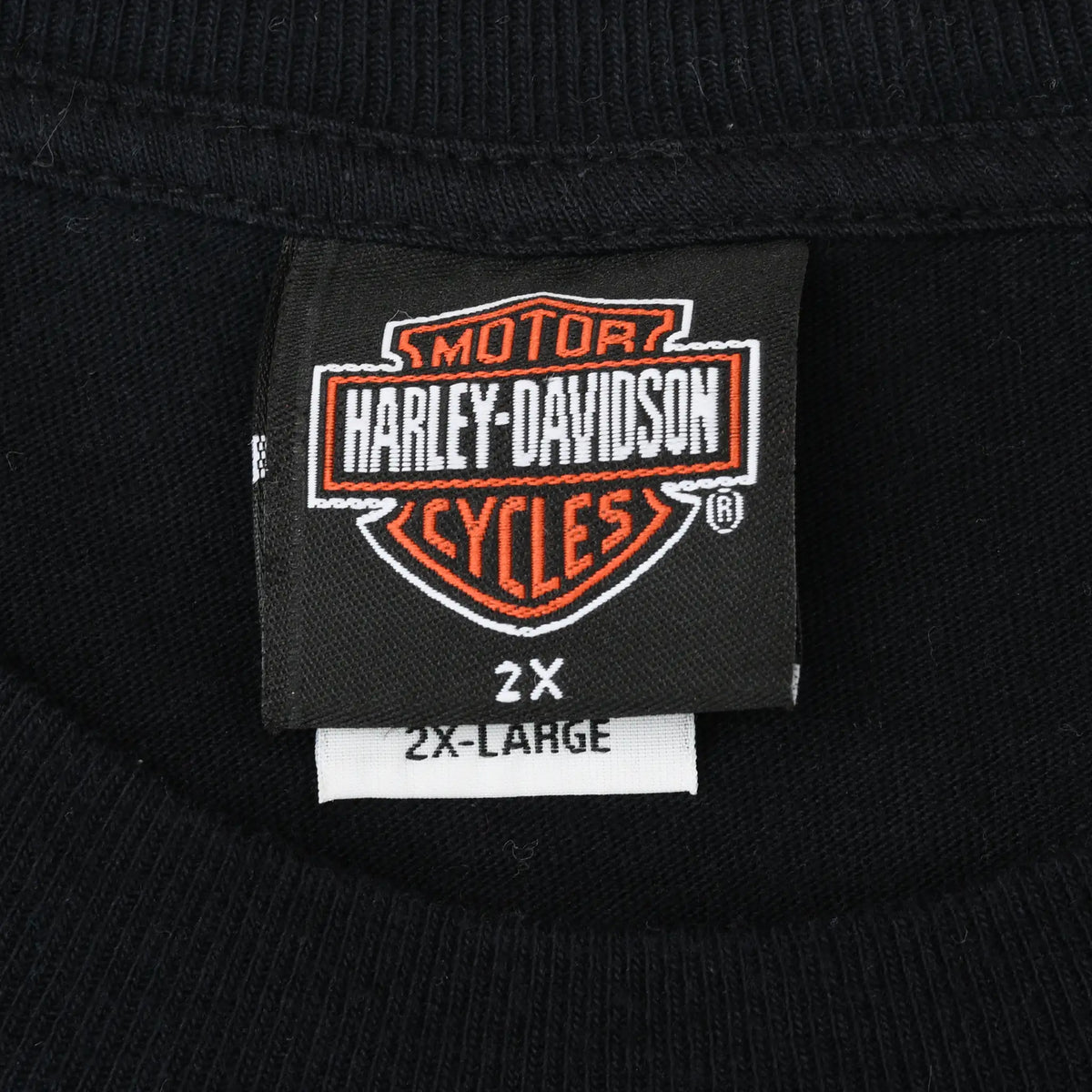 Harley-Davidson neck label showing 2X size on black T-shirt