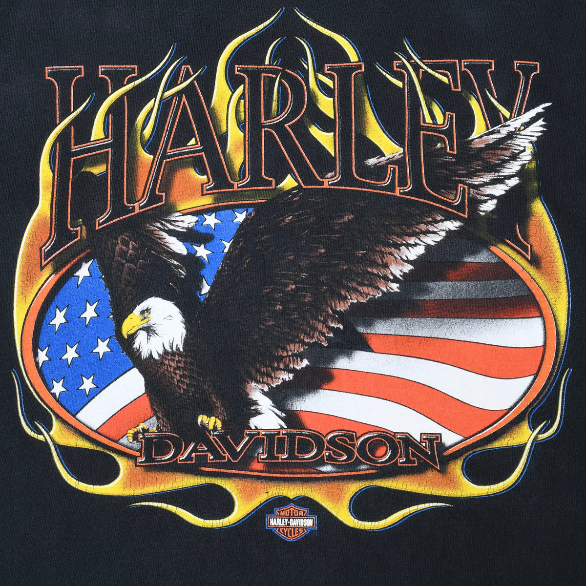Close-up of Harley-Davidson bald eagle, American flag, and yellow flame front print