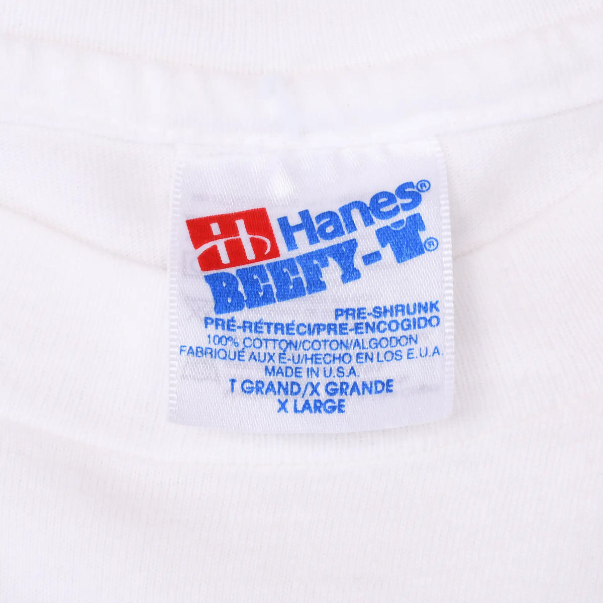 Hanes Beefy-T neck label marked XL and made in USA inside white T-shirt