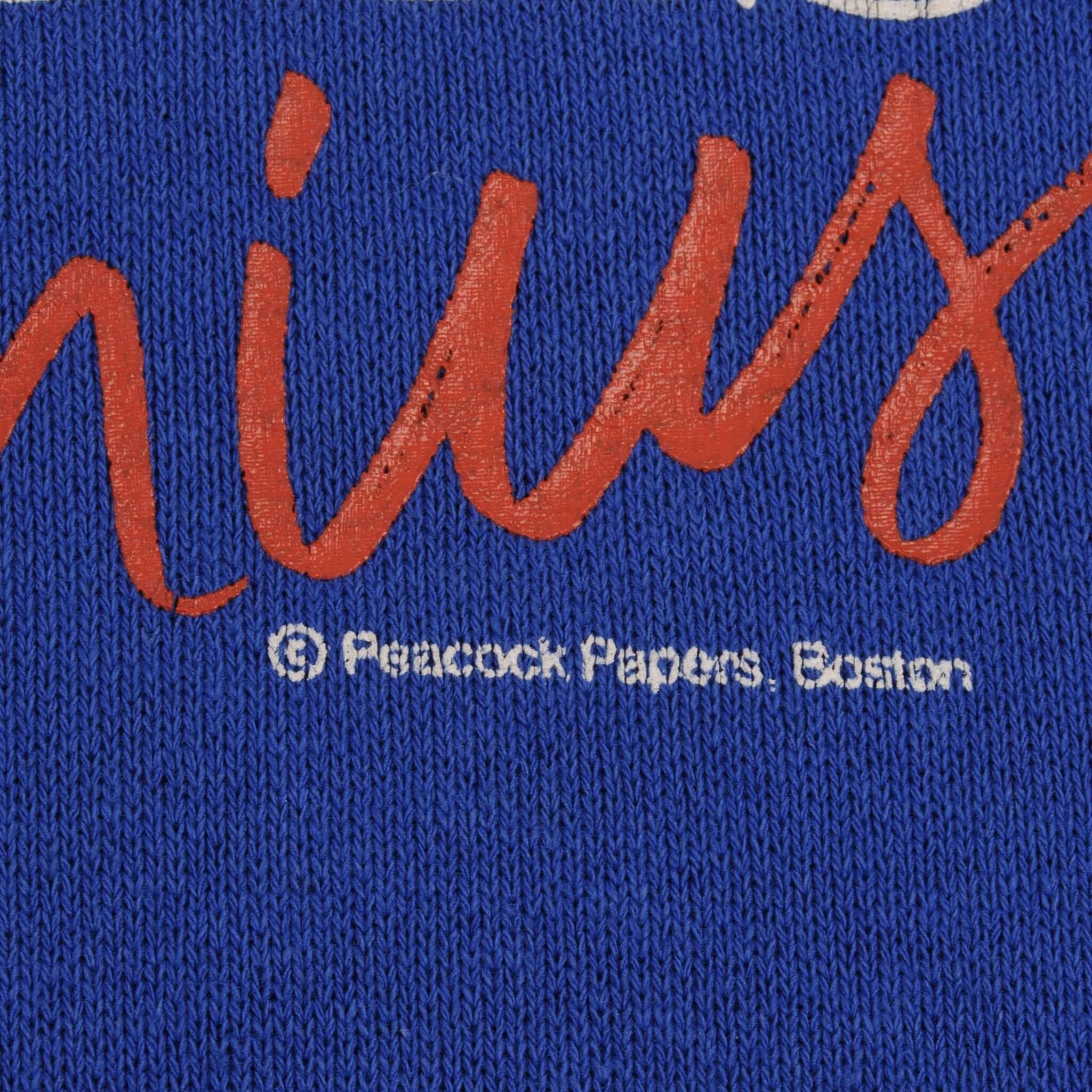 Close-up of Peacock Papers Boston copyright text beneath the front graphic
