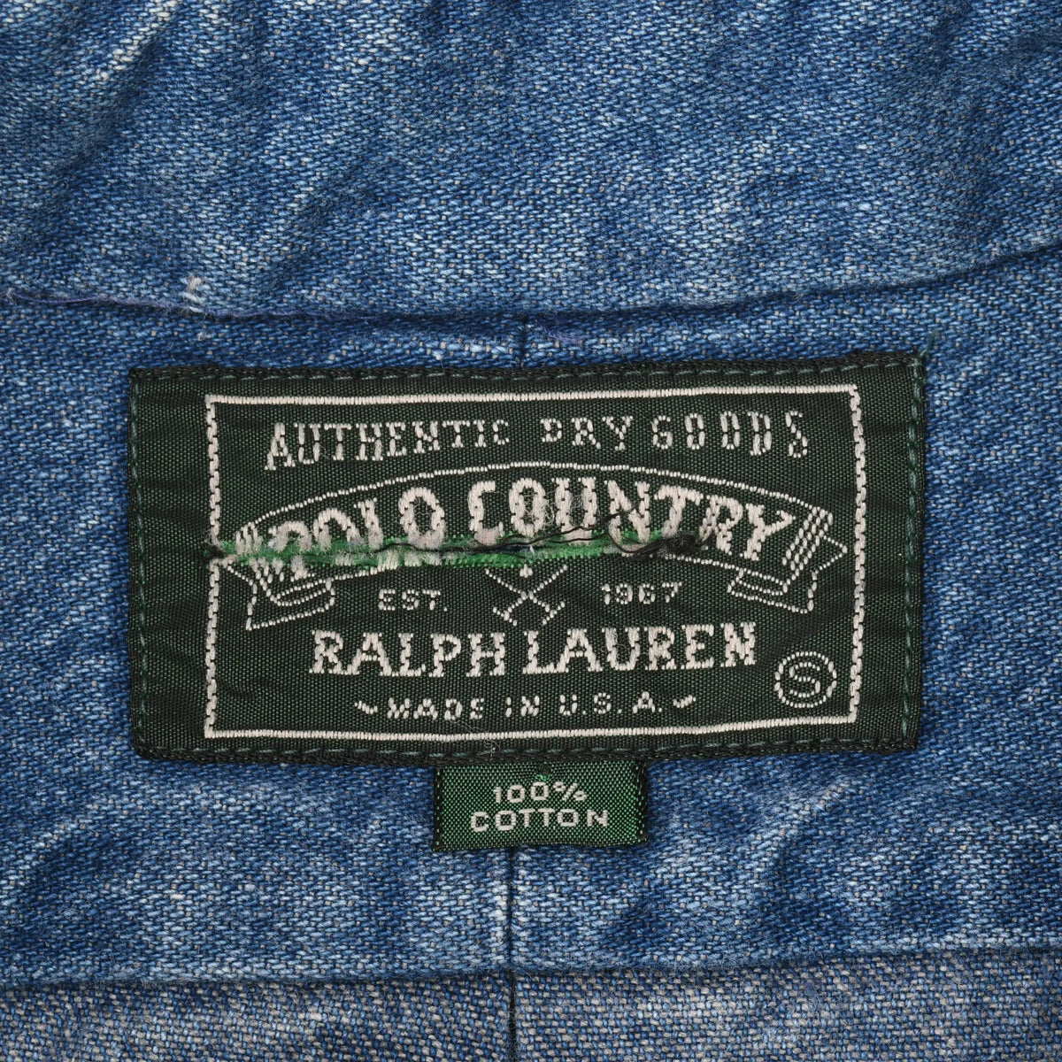 Close-up of Polo Country Ralph Lauren neck label with Made in U.S.A. and 100% cotton tags
