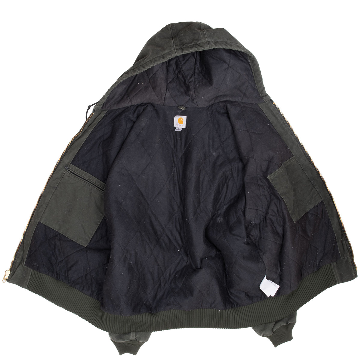 Open Carhartt jacket showing black quilted interior, hood lining, and inner pockets