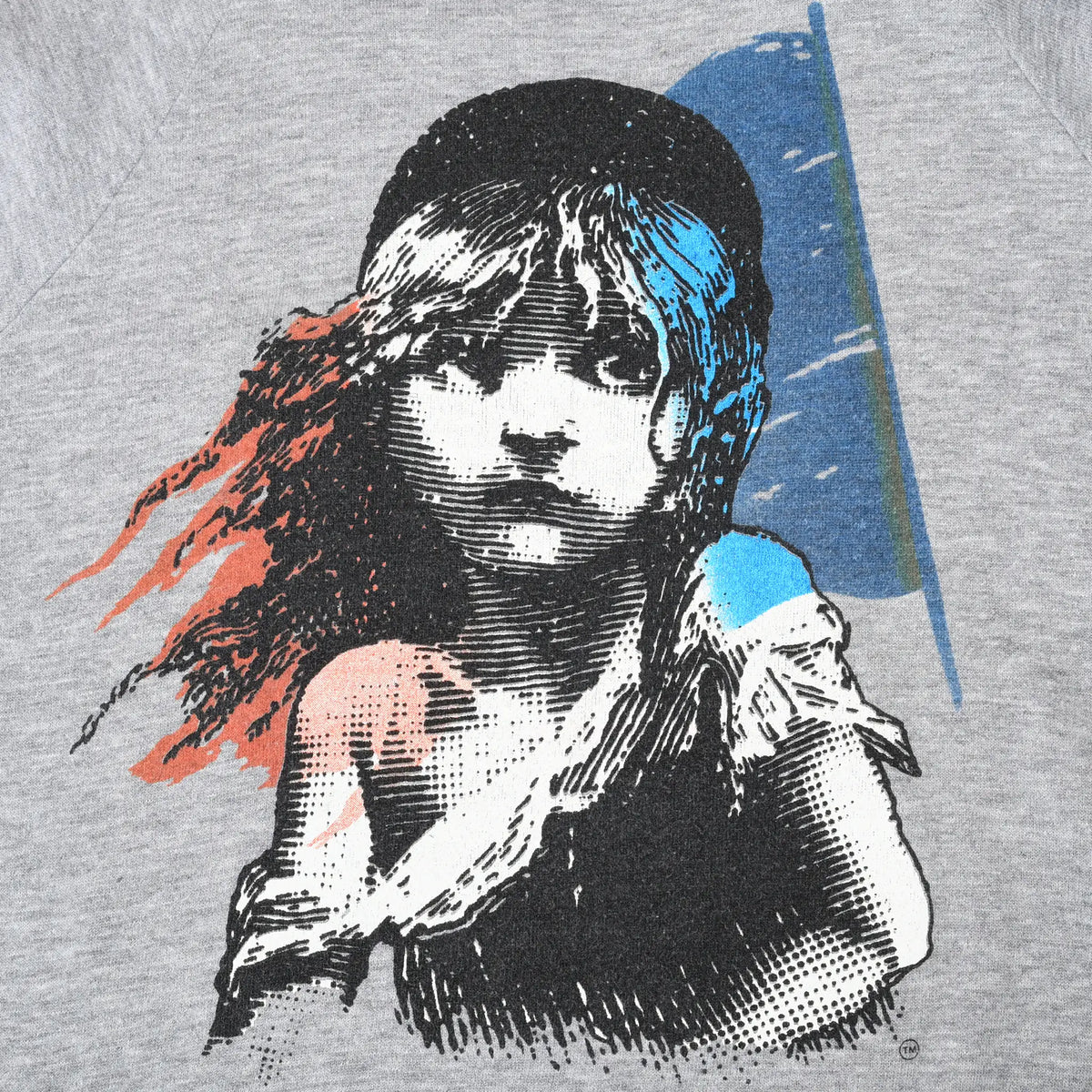 Close-up of multicolor Cosette character graphic on gray sweatshirt
