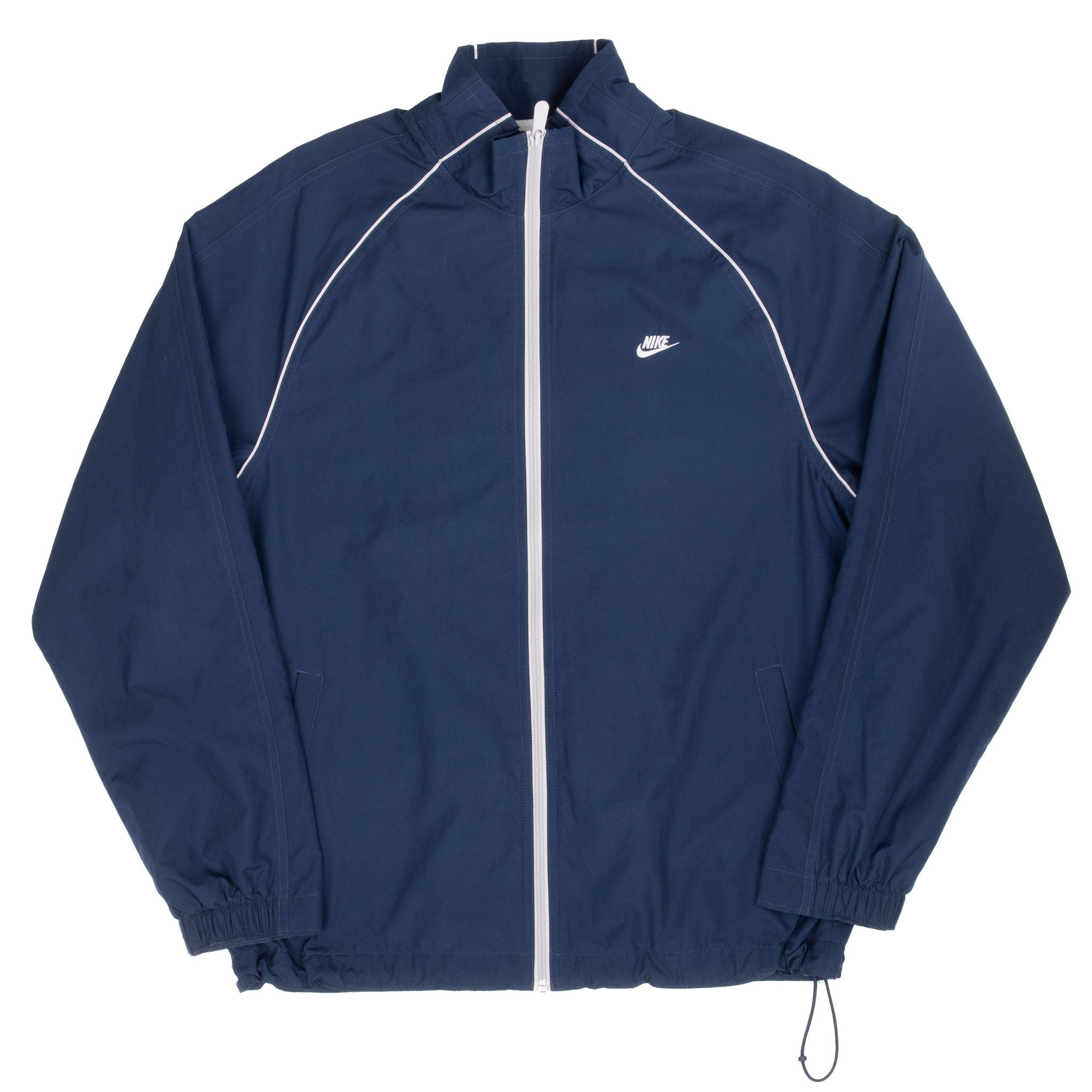 Full front of navy Nike windbreaker with stand collar, pockets and drawcord hem