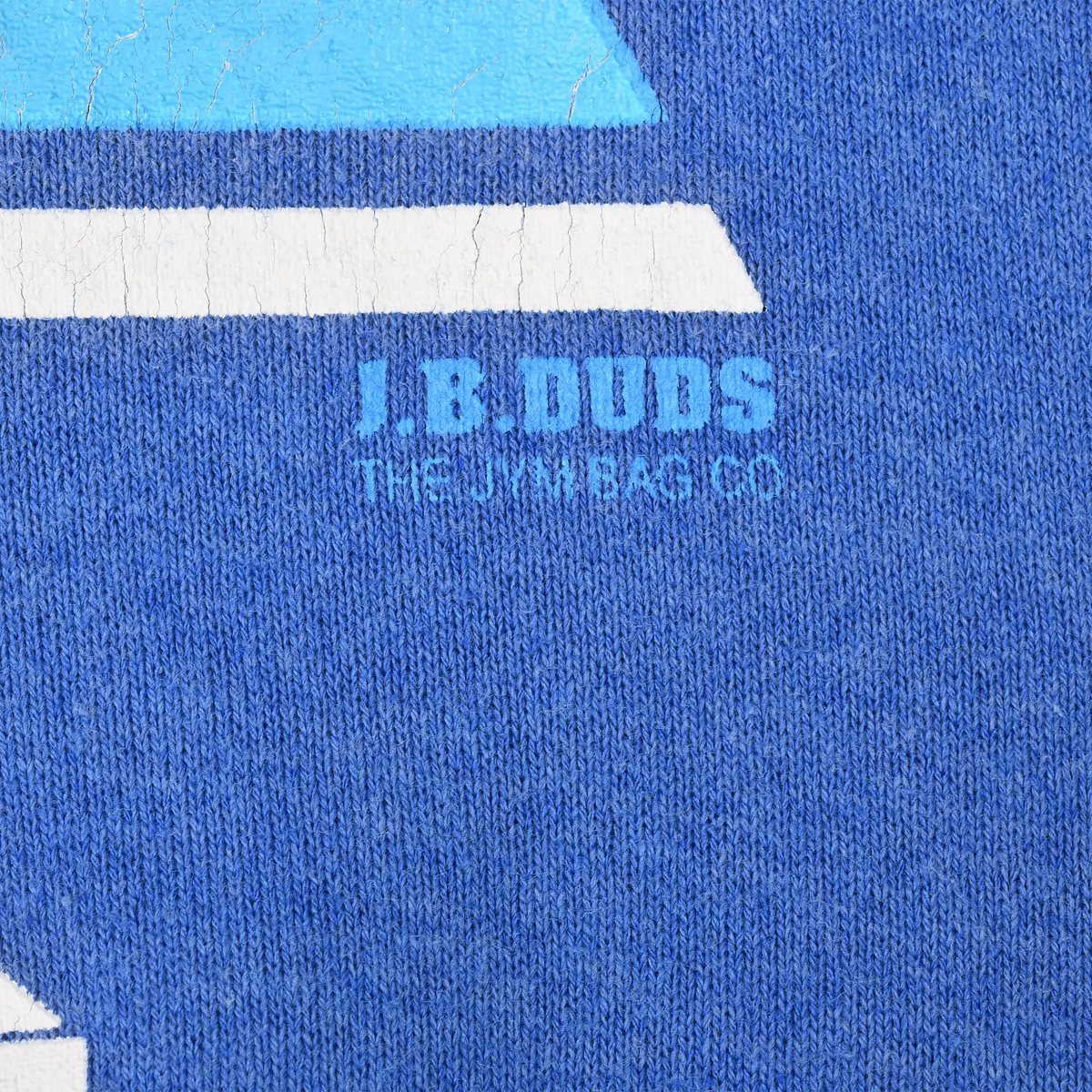 Close-up of small J.B. Duns signature printed beside the BYU sweatshirt graphic