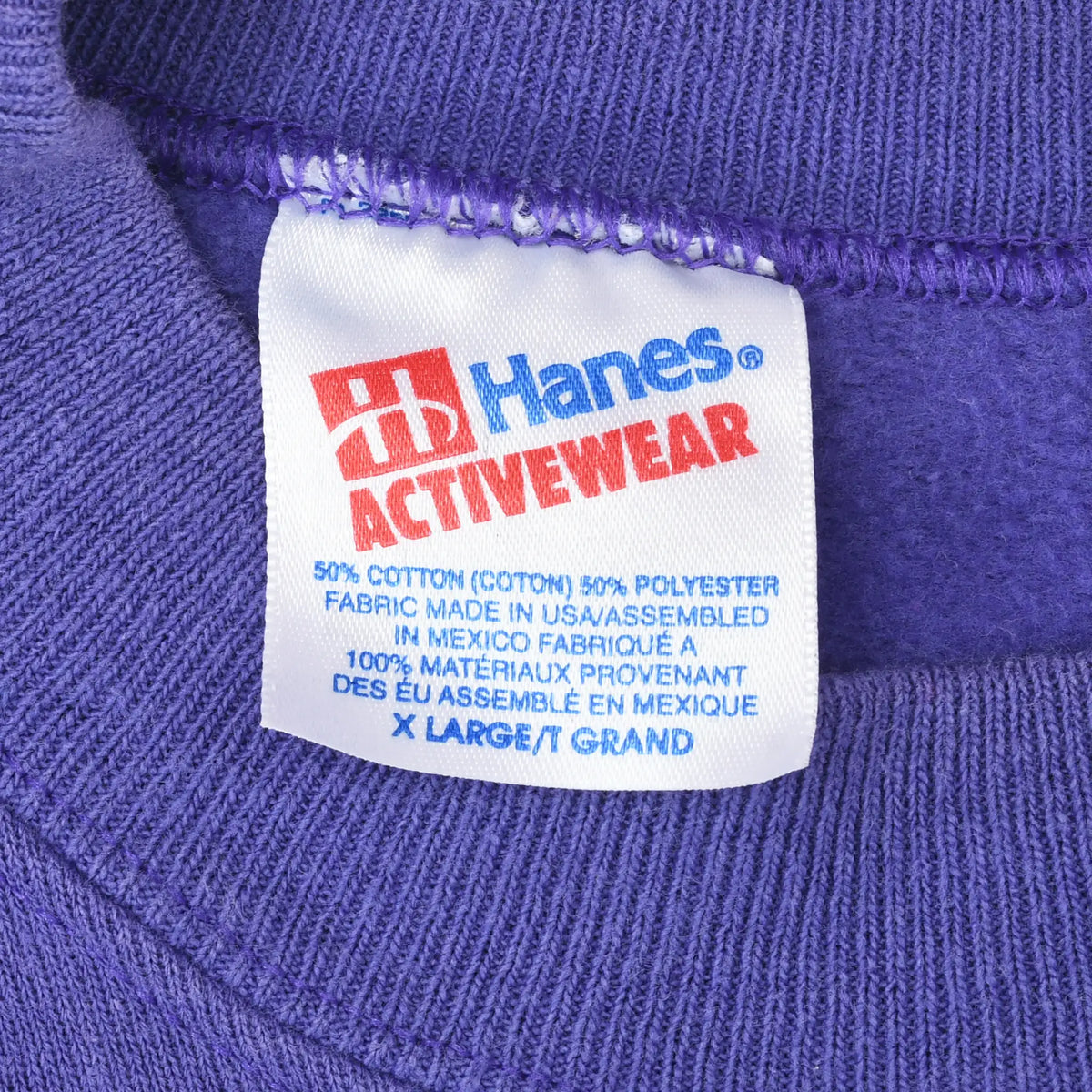 Close-up of Hanes Activewear neck label inside the purple sweatshirt