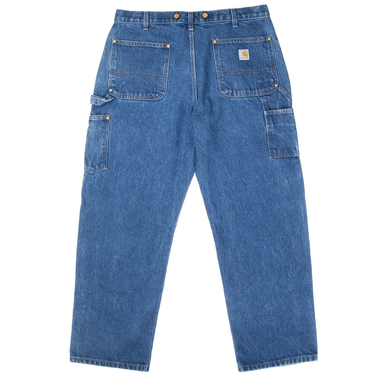 Back of blue Carhartt B07 carpenter jeans with patch pockets and utility pockets