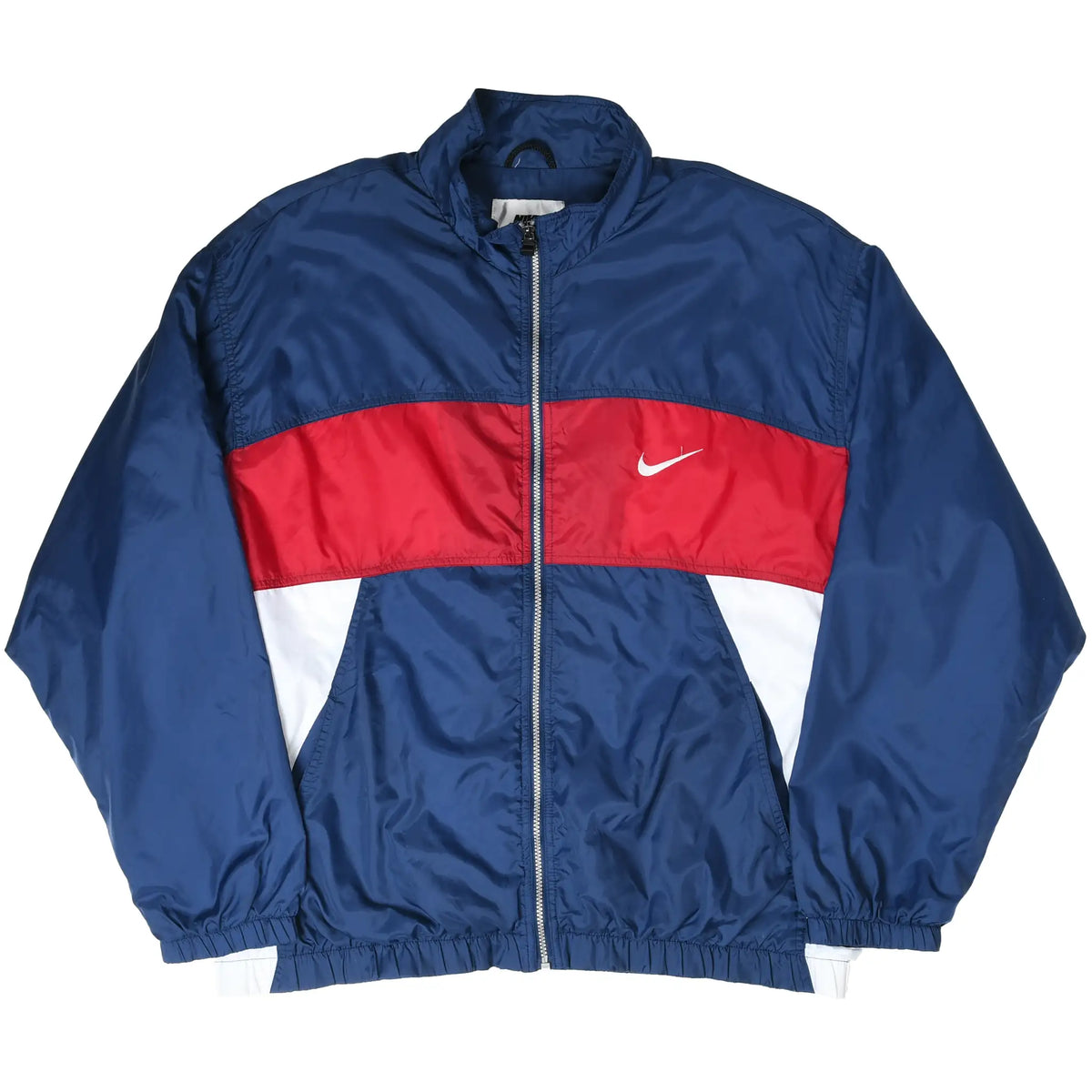 Front view of navy Nike zip-up windbreaker with red and white color-block panels