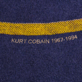 Vintage Blue All Over Print Nirvana Kurt Cobain 1967-1994 Screen Stars Best Tee Shirt Size Large Made In USA With Single Stitch Sleeves.