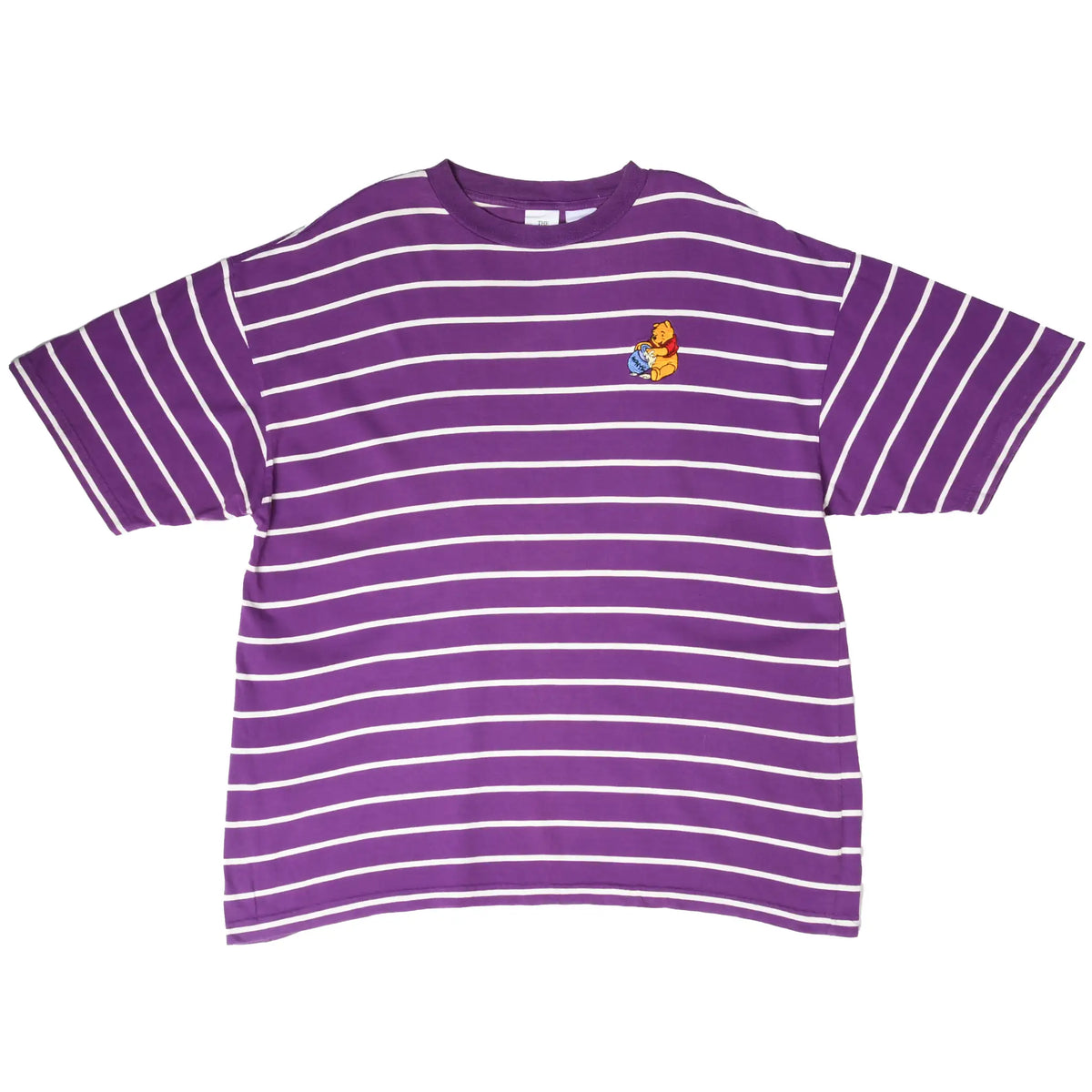 Front of purple and white striped Disney tee with Winnie the Pooh chest embroidery