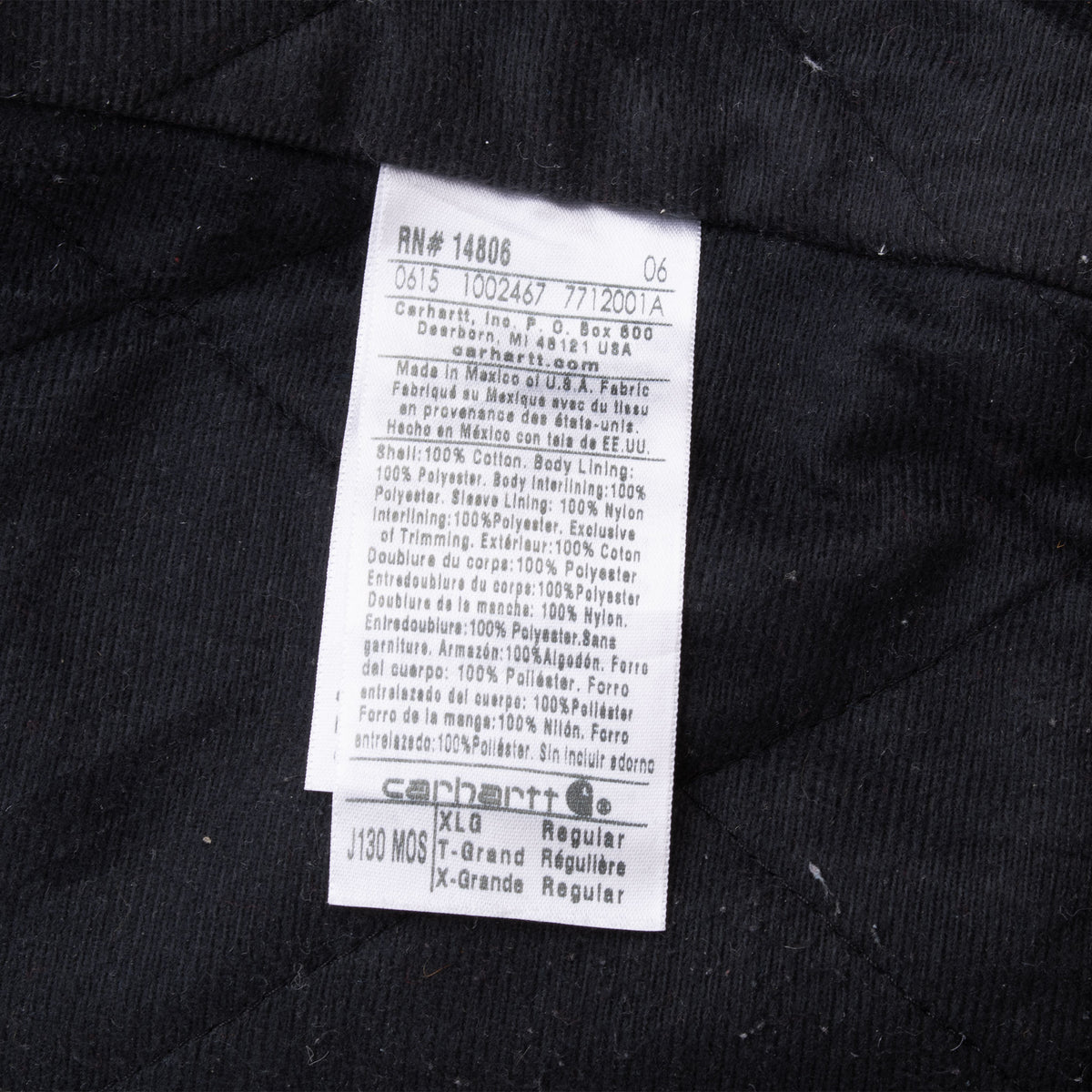 Interior care label showing Carhartt style J130 MOS and XL regular sizing