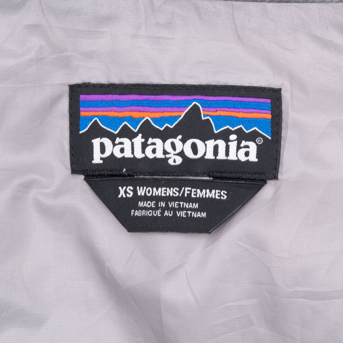 Patagonia neck label marked XS women's inside grey Nano Puff jacket