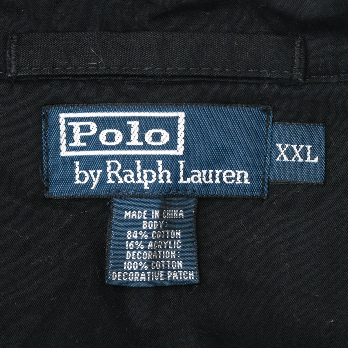 Polo by Ralph Lauren XXL neck label and fabric content tag inside black jacket
