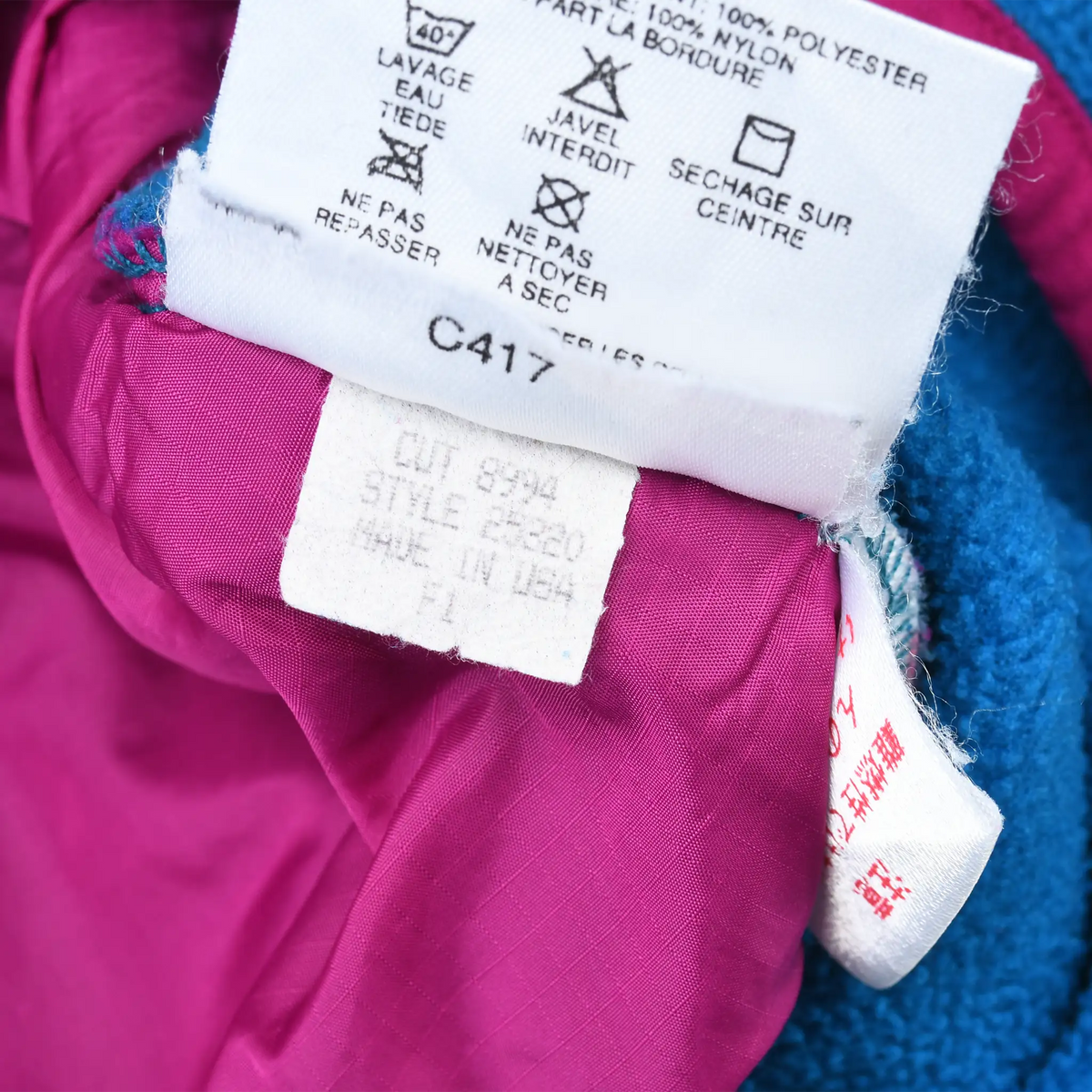 Close-up of care and style 25320 labels inside the Patagonia fleece pullover