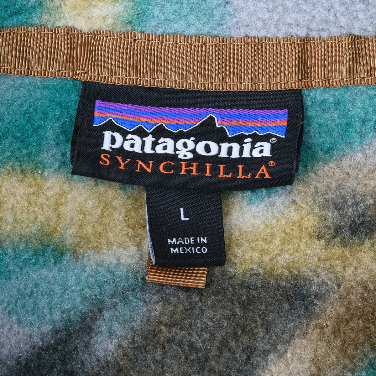 Patagonia Synchilla neck label with size L and Made in Mexico text