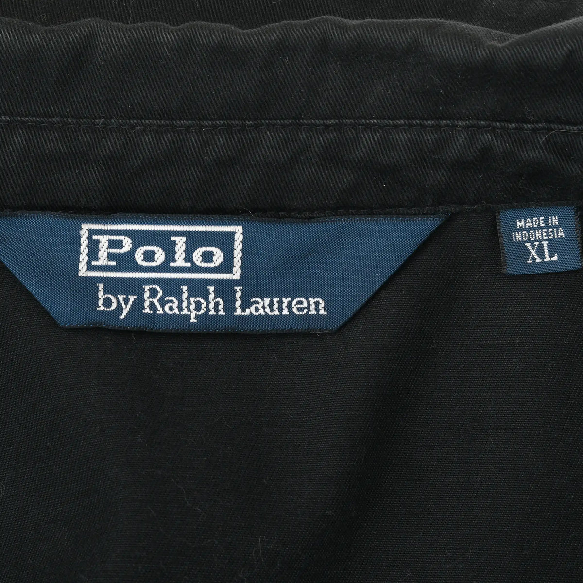 Polo by Ralph Lauren neck label and XL size tag inside black jacket